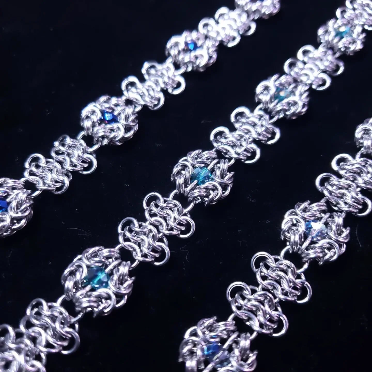 Rosettes &amp; Romanov Bracelets in Stainless Steel.

Length: 6&frac34;&quot;
Width: &frac12;&quot;
Beads: 4mm faceted glass