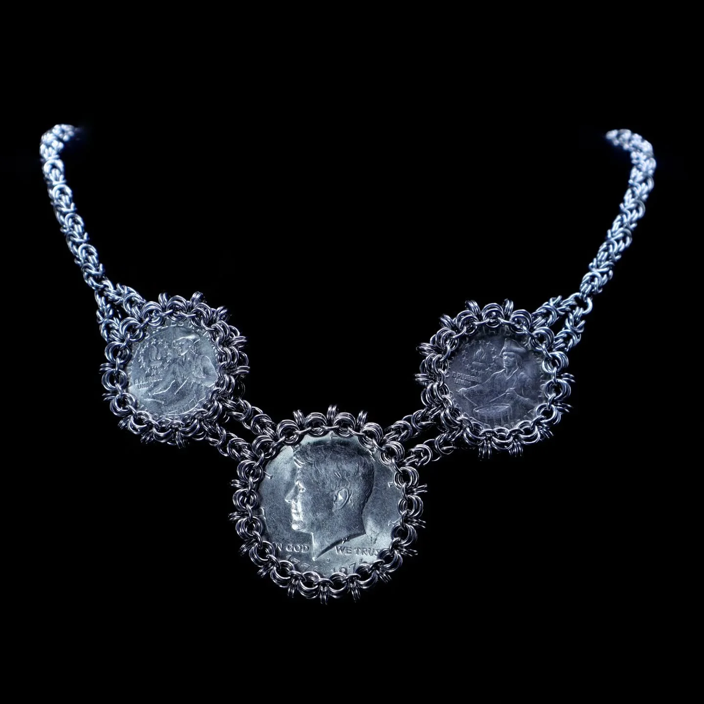 Bicentennial Coin Necklace 

Kennedy Half Dollar for the center focal with two Drummer Boy Quarters.

#mailleafire #chainmaille #coincollection