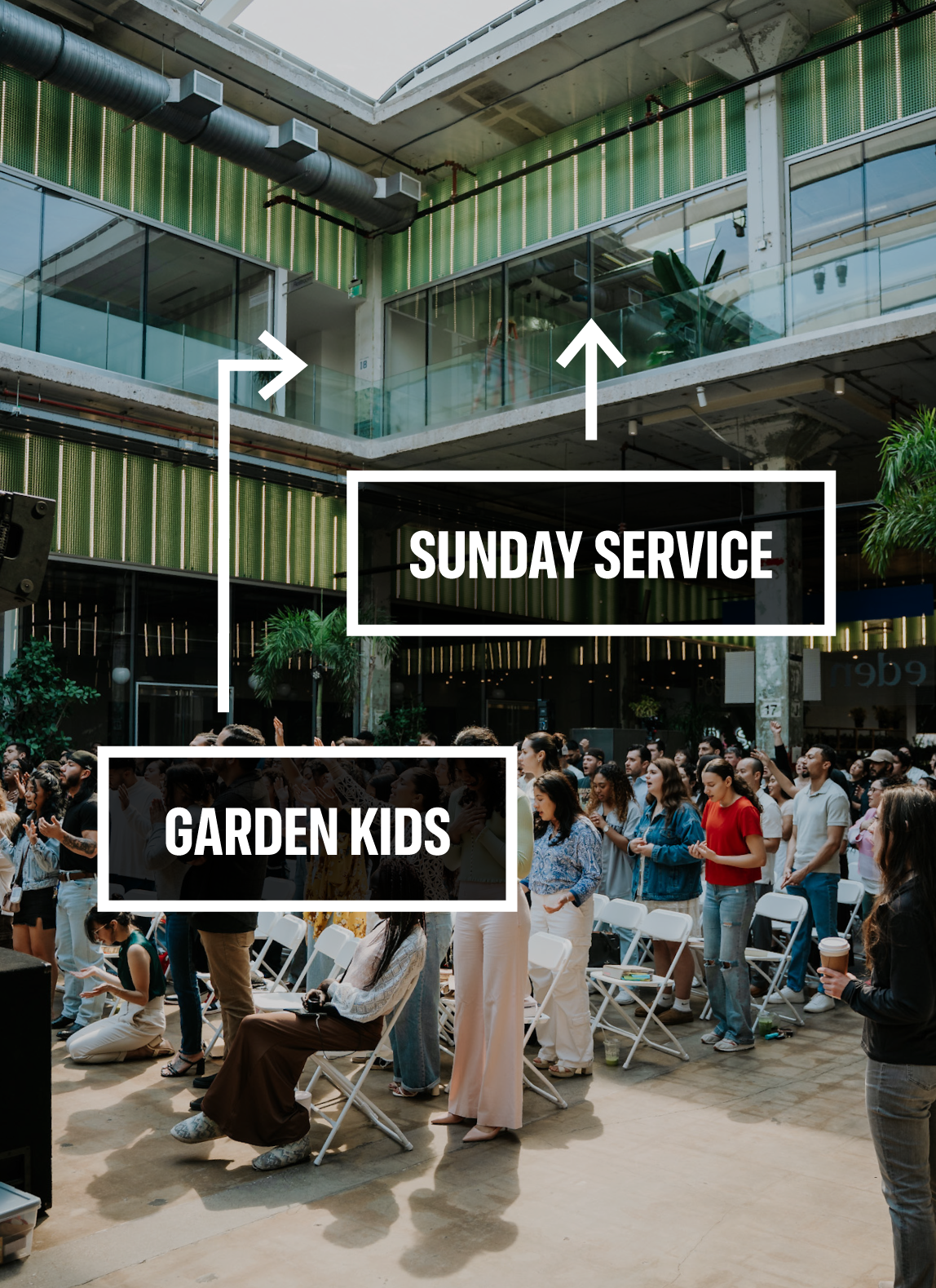 A crowd of people gathered in a modern indoor space with multiple levels and green accents. Discover Eden Church Houston — a multi-denominational Christian community rooted in the teachings of the early Acts church.