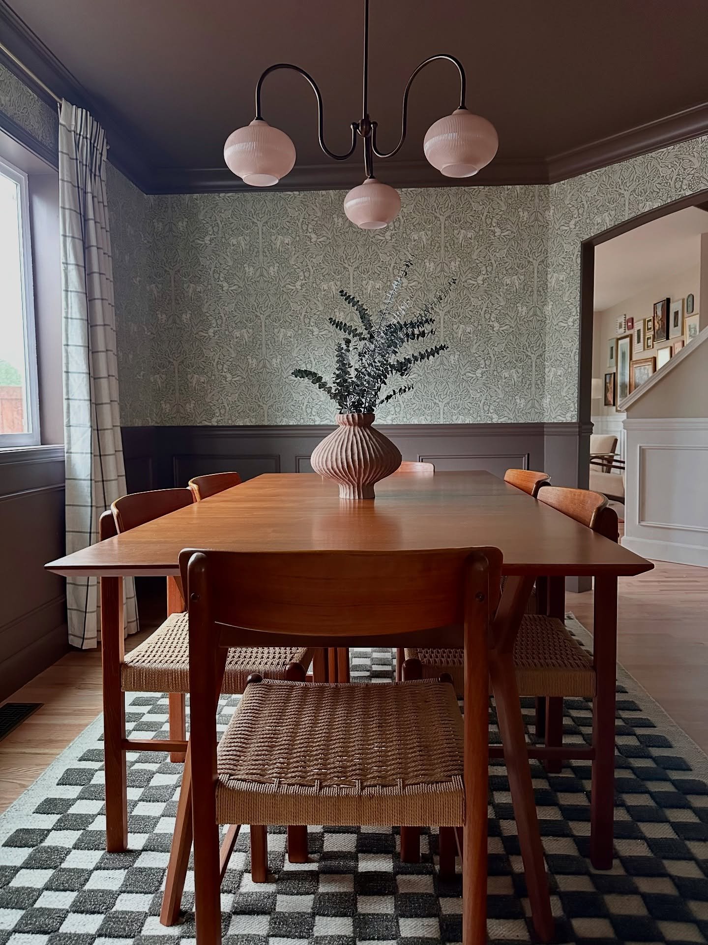 🤍Sneak peek time🤍 The dining room got a major glow-up&mdash;new flooring, statement lighting, bold paint, wallpaper, and drapery that pulls it all together. It&rsquo;s just a glimpse of the full kitchen, dining, and pantry transformation. Can&rsquo