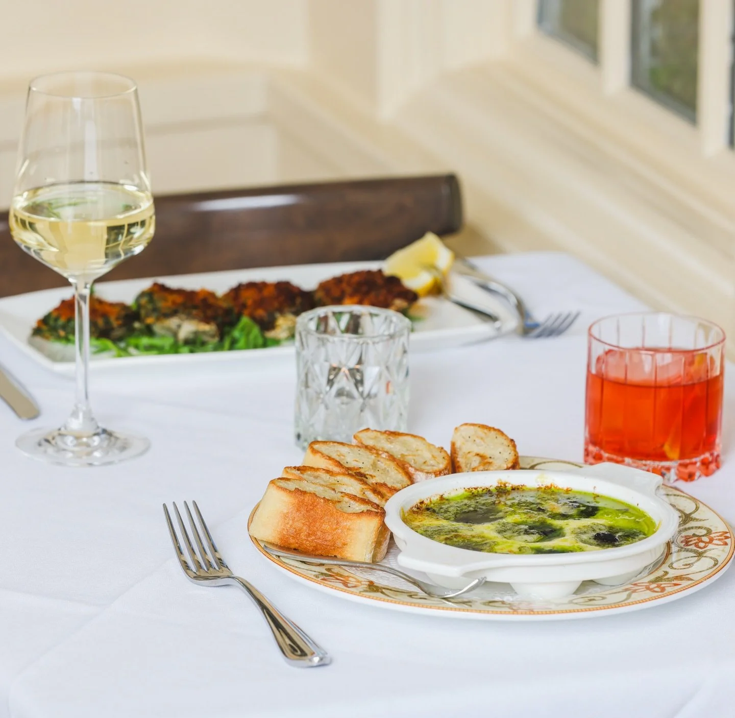 The question of the day. Which appetizer do you crave every time you join us?

Is it the menu staple Escargot, bubbling in garlic herb butter and served with toasted baguette? Or perhaps the Coastal Oyster Rockefeller, a decadent nod to the sea. Or m