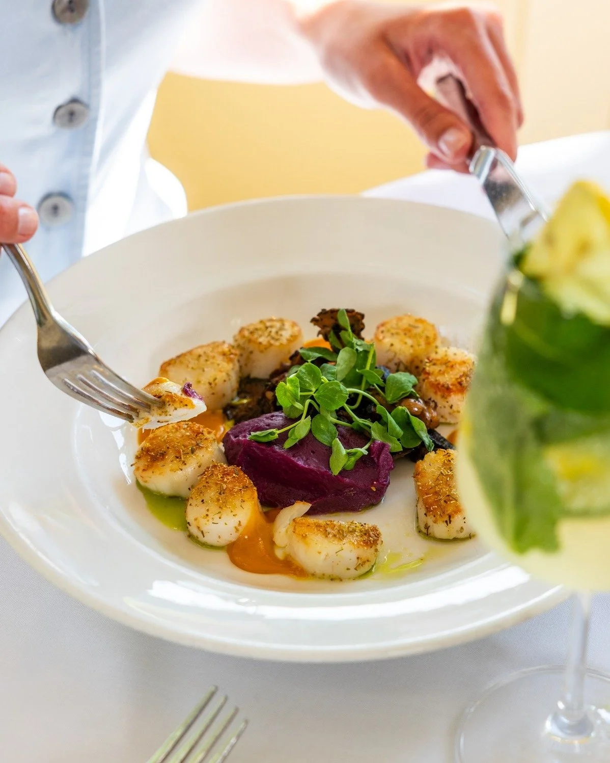 Our Fennel Pollen Dusted Cape May Scallops celebrate the season with perfectly seared local scallops, ginger-spiced Japanese sweet potato, roasted wild mushrooms, and a vibrant saffron citronette. Every element is carefully balanced to highlight the 