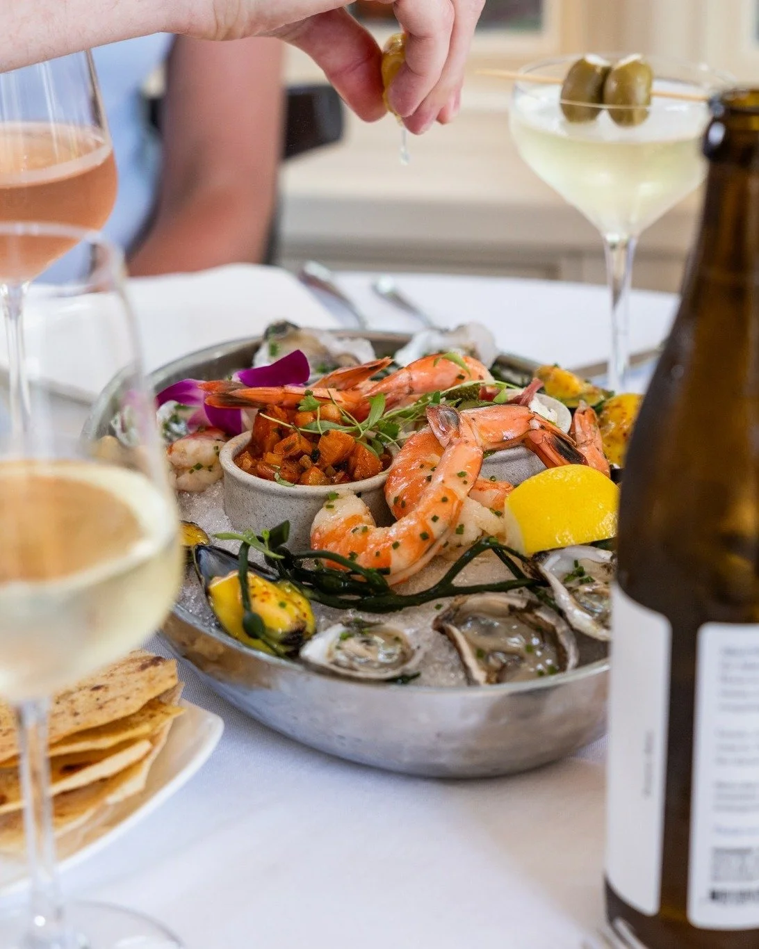 Every bite of our Washington Inn Grand Seafood Platter tells a different story: Jersey Shore brine, New England sweetness, bright ceviche acid, smoky richness from the trout p&acirc;t&eacute;. Pour something crisp alongside it and let the story unfol