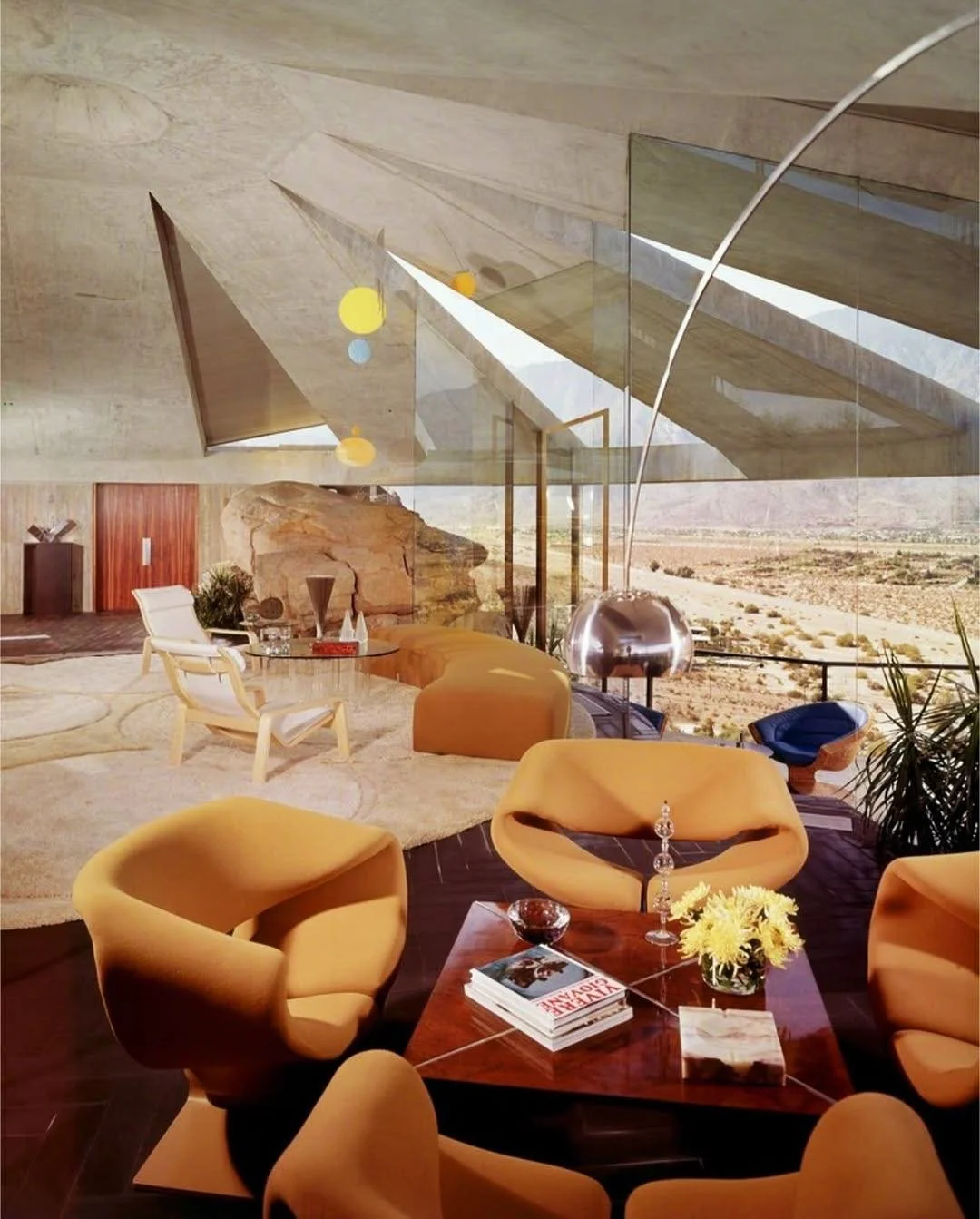 Insane.

The Elrod House designed by John Lautner for Arthur Elrod, Palm Springs, 1968. A circular living room carved from the desert itself. Concrete, glass, and the conviction that a home should feel like a landscape.

Photography by Leland Y. Lee 