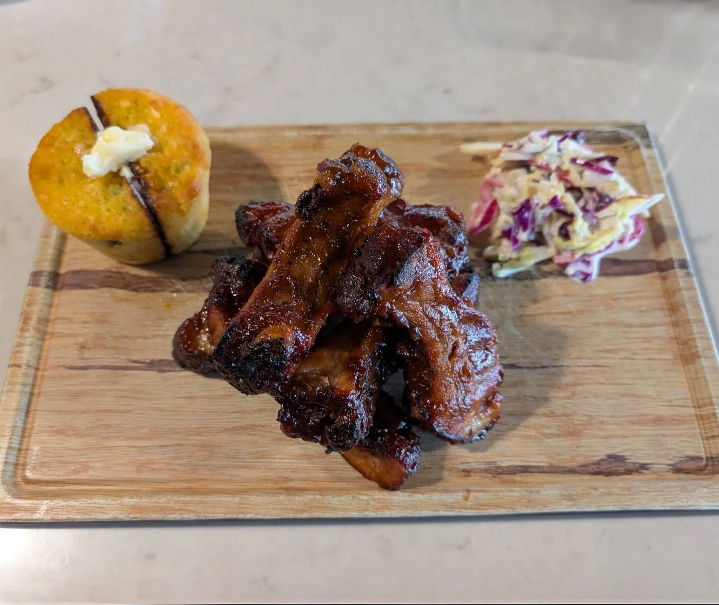 🚨NEW MENU ITEM: Our BBQ Baby Back Ribs are alder-smoked, seasoned with jerk seasoning, glazed in rich BBQ sauce, and paired with jalape&ntilde;o cornbread topped with maple butter and a side of fresh house-made apple-craisin slaw. 

🔥This is comfor