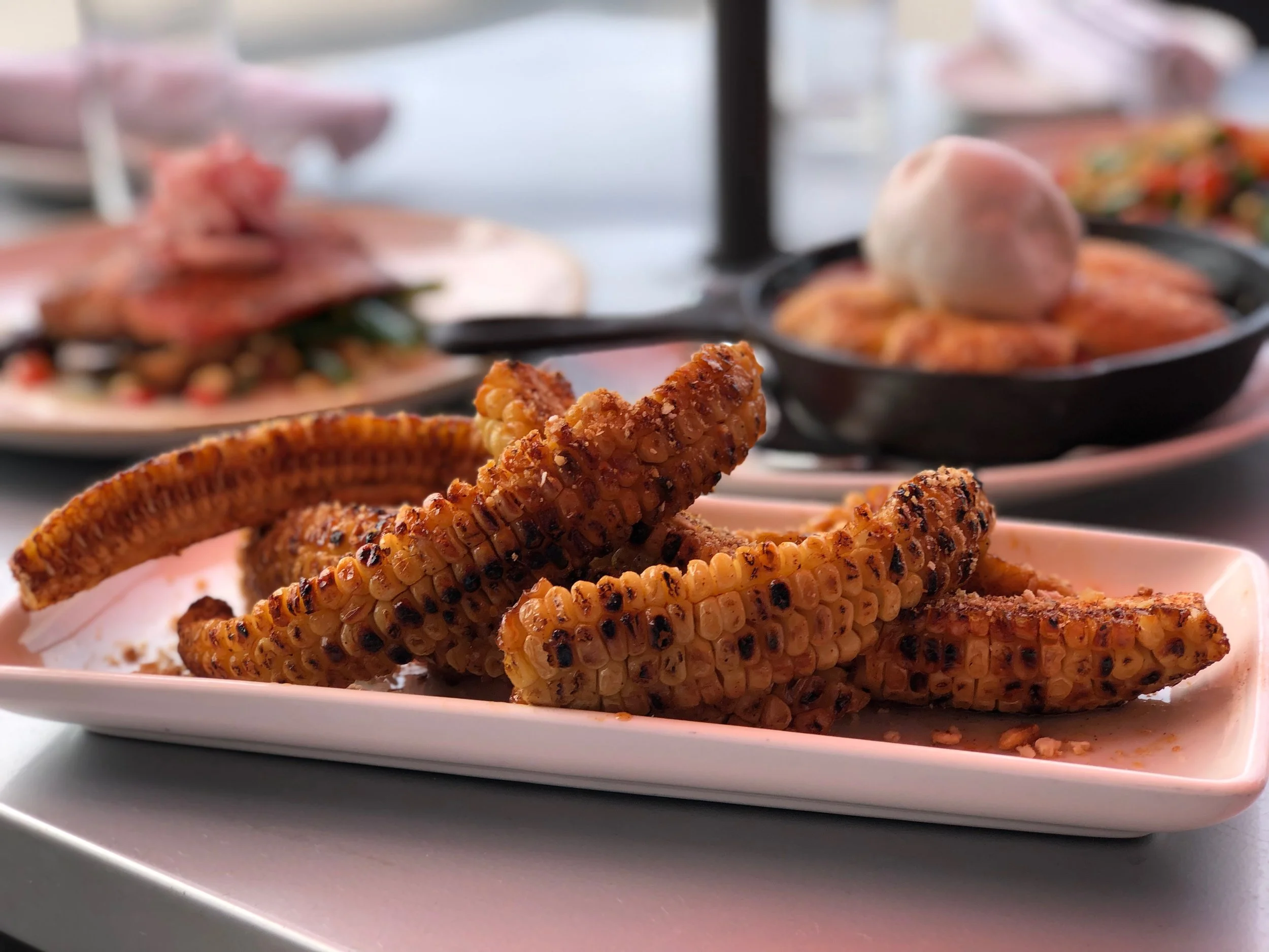 🌽 Meet your new obsession: our seasonal corn ribs. Made with locally grown fresh white corn charred just right, brushed with chipotle honey butter, and finished with a crunch of corn nuts.&nbsp;

Here for a limited time only &mdash; get in before th
