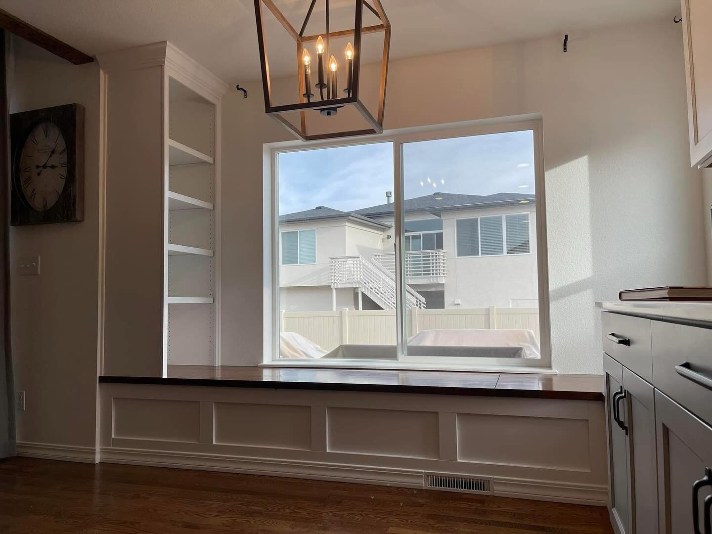 The ultimate kitchen upgrade!! 
This absolutely stunning window seat &amp; cookbook bookshelf is the perfect addition to this space! 100% custom built, this fits the space beautifully and gives so much amazing seating at the perfect height for their 