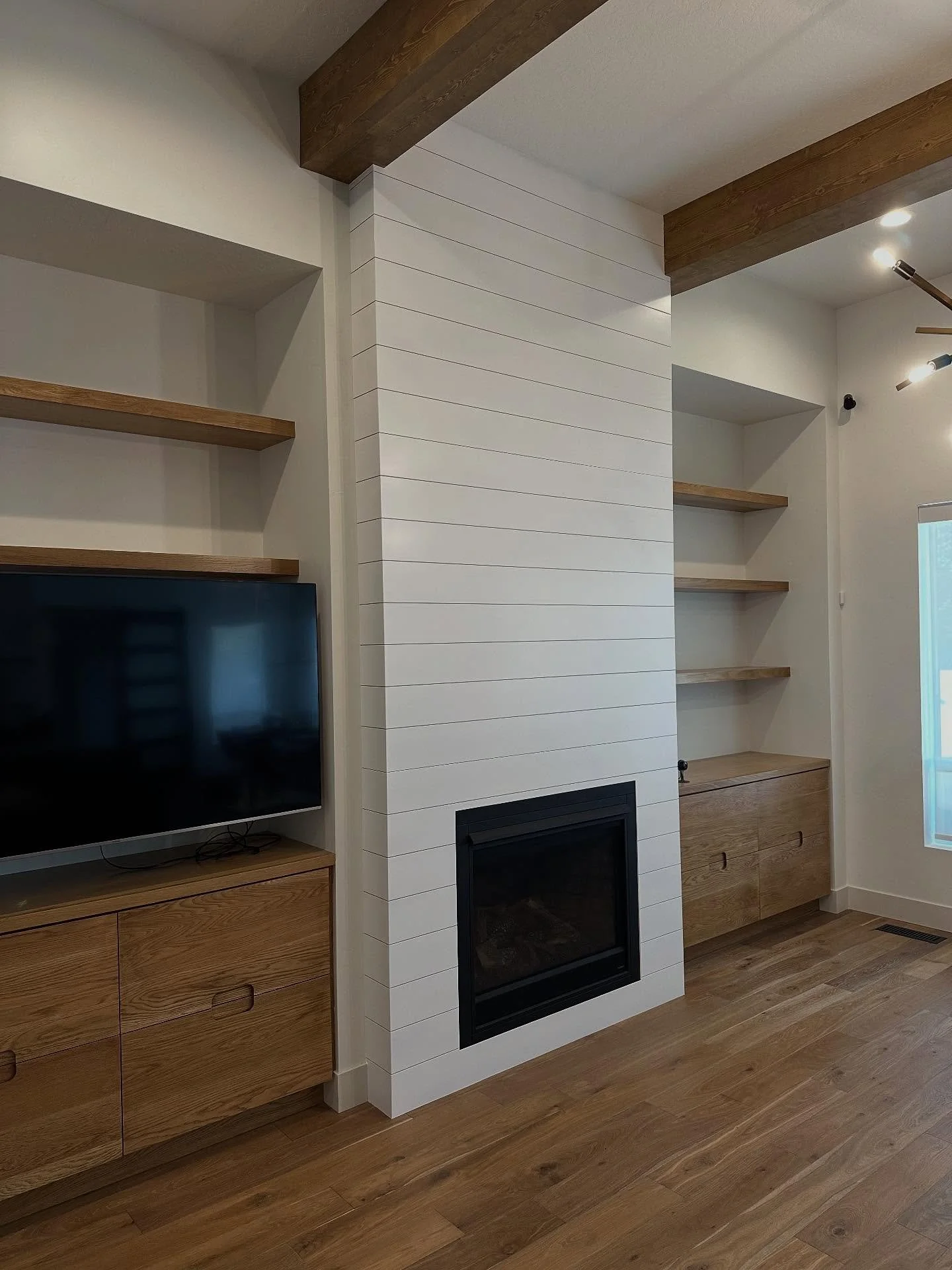 A breath of fresh air!! 
This fireplace received the ultimate face lift! From dark distressed and rough cut wood to a stunning custom made shiplap wrap! 
It&rsquo;s as it should have always been!! Clean, crisp and simply beautiful! 

#meridianidaho #