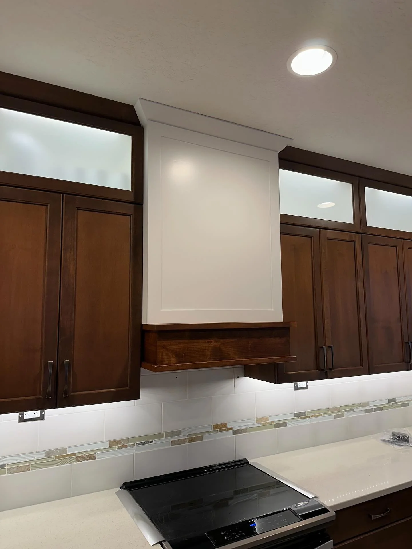 When an elegant change makes a HUGE impact!! 
This custom hood elevates this kitchen beautifully. No more hanging microwave and hello fresh craftsman detailed hood with a beautifully color matched wood detailing!! 

#meridianidaho #cranecustoms #loca