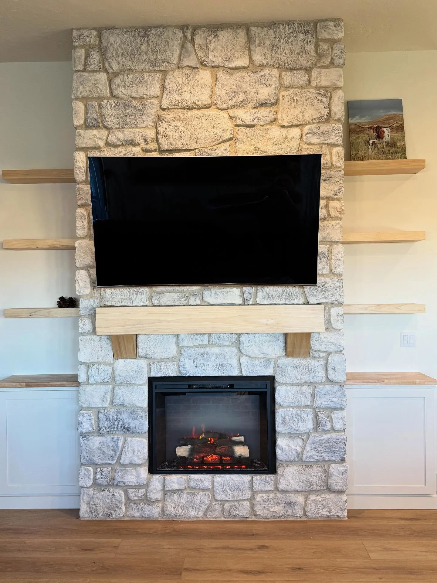 A cozy fireplace just in time for the holidays?! Yes please! This floor to ceiling custom built fireplace is the perfect addition to our clients home. With 11&rsquo; ceilings it is absolutely breathtaking with gorgeous natural wood finished details, 
