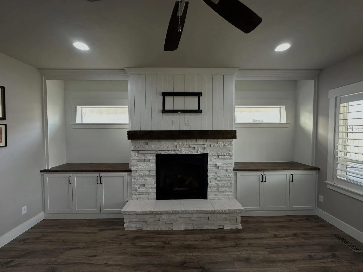 From DIY to 100% custom! 
This fireplace received a stunning update with custom built shaker cabinets, encased sides, a custom shiplap wrap and a gorgeous showstopping natural wood mantle!! 

#meridianidaho #cranecustoms #localcarpenter 
#finishcarpe