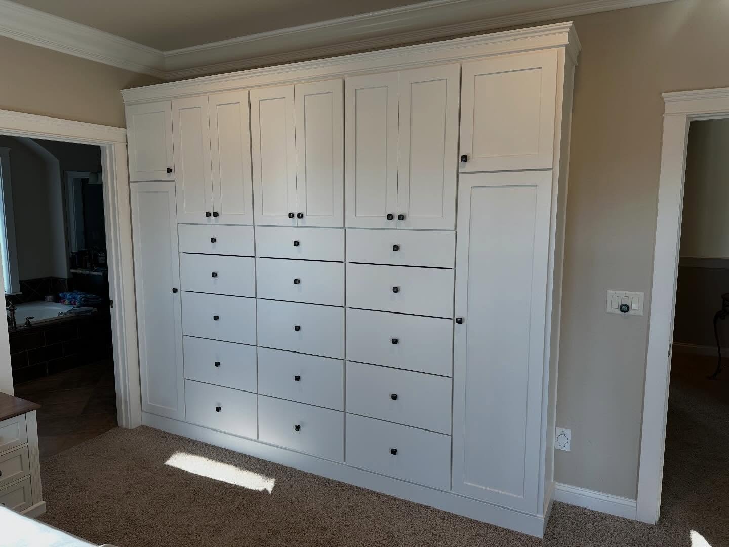 Lack of storage got you down? Check out this incredible custom built wardrobe!!! Complete with not 1, not 2 but 15 100% custom built craftsman drawers; two oversized side cabinets and then even more cabinet storage! This is a dream come true for any 