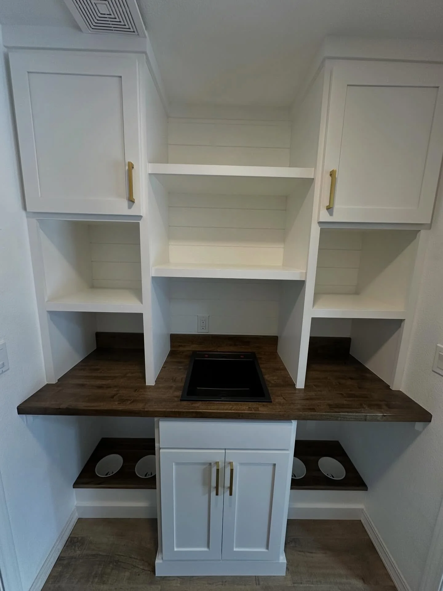 Limited space maximum storage!!! 
This one is a beautiful combination of function meets character. Complete with custom built appliance storage, built in dog feeding stations, and shaker cabinets!! Everything has a place and purpose! 

#cranecustoms 