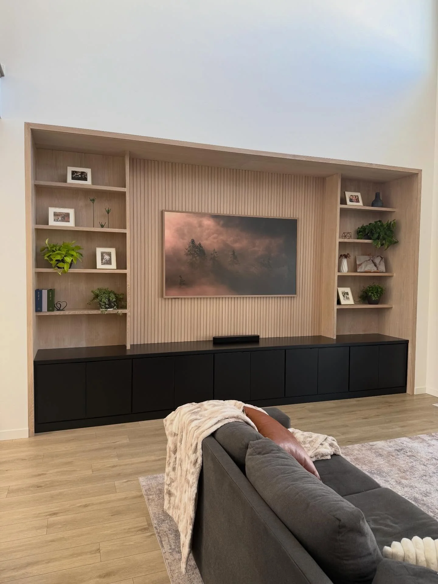 Build update!!! 
We love seeing our custom builds take life with decor!! Check out how beautiful this entertainment center looks! The decor is perfection, highlighting all of the stunning details from the craftsmanship beautifully! 

#meridianidaho #