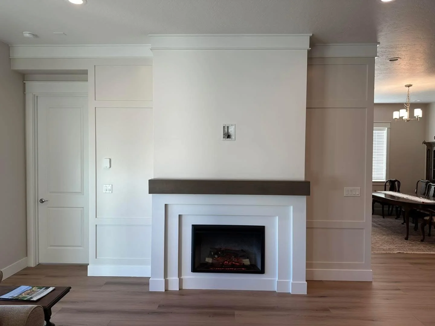 Decorative board and batten wall with custom trim details in a modern Meridian, Idaho home.