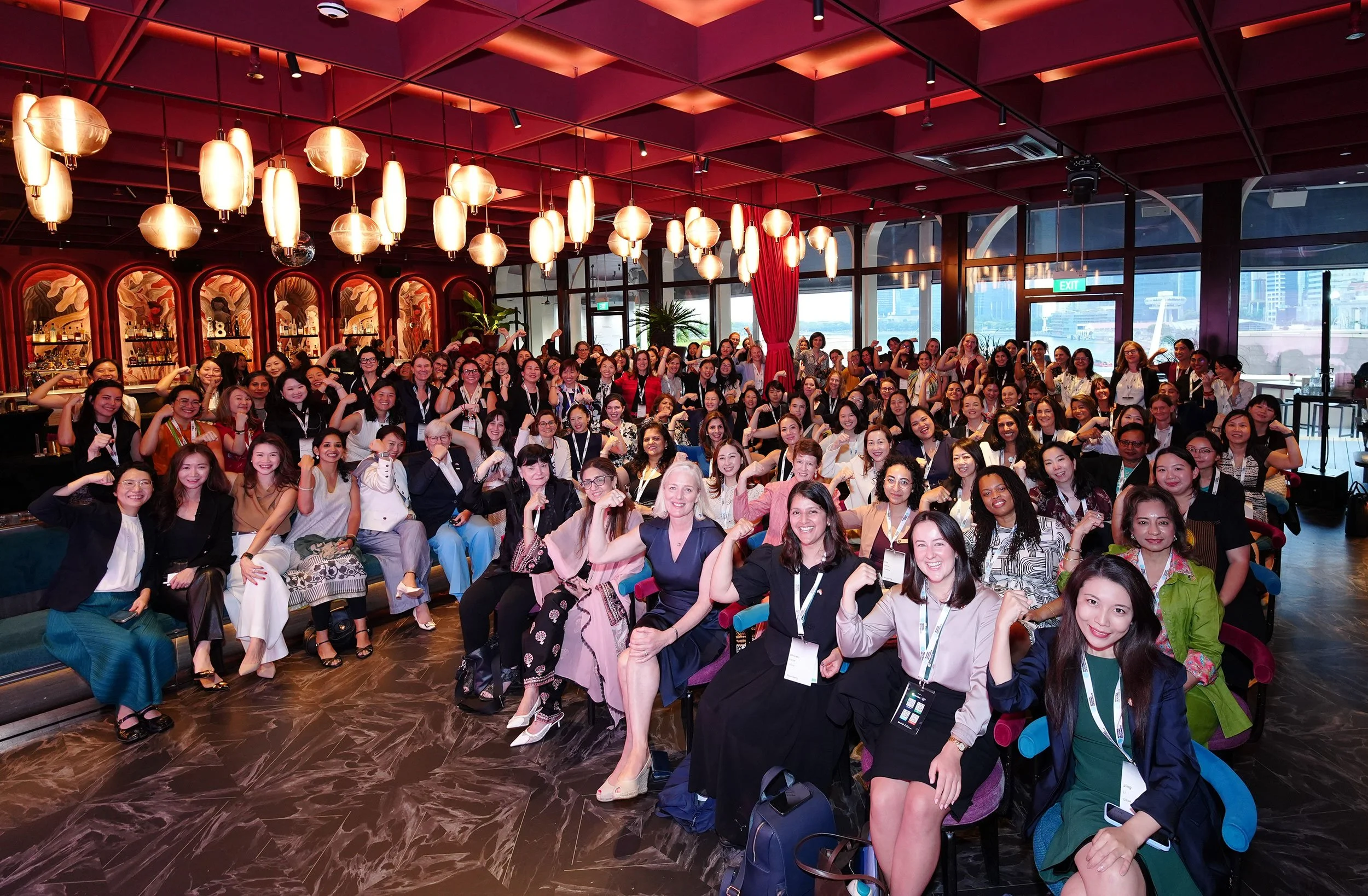 A group of women climate leaders celebrating at Ecosperity Week 2026