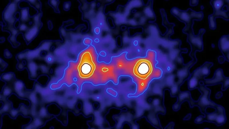 Dark matter filaments (shown in red) bridge the space between galaxies (shown in white) on this false color map.
