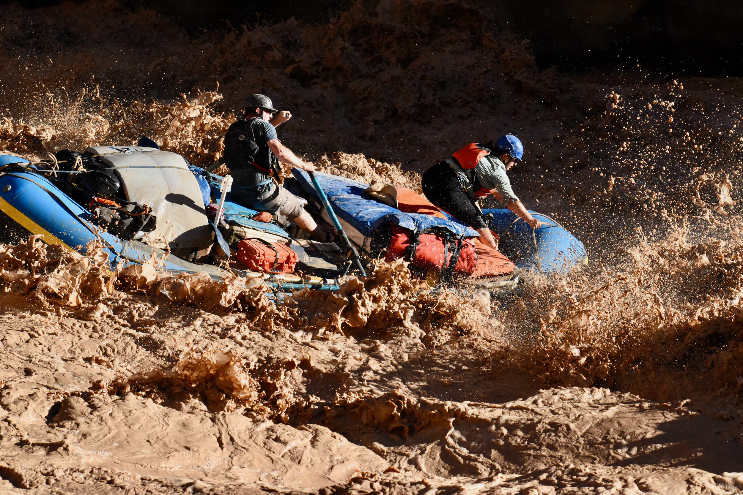 A pair of rafters prepare for white water rapids.
