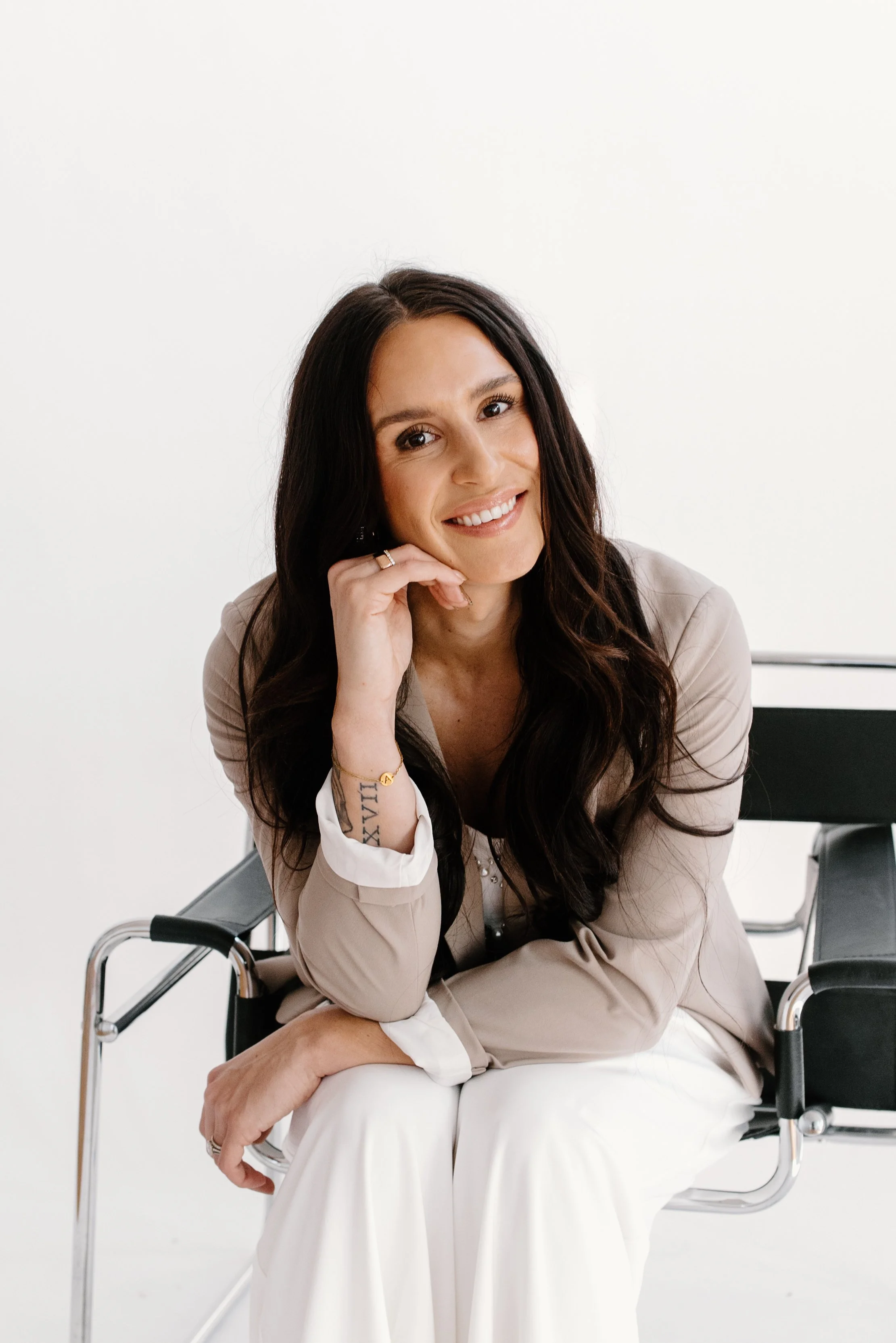 Licensed Esthetician and Owner of Allure Aesthetics and Beauty Co. in Oregon, Illinois, providing a facial treatment for a client looking for corrective skincare and facial services.