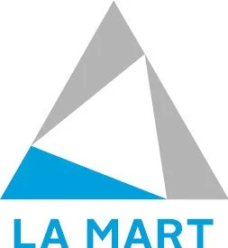 Logo of LA Mart with a stylized triangle design in gray and blue.