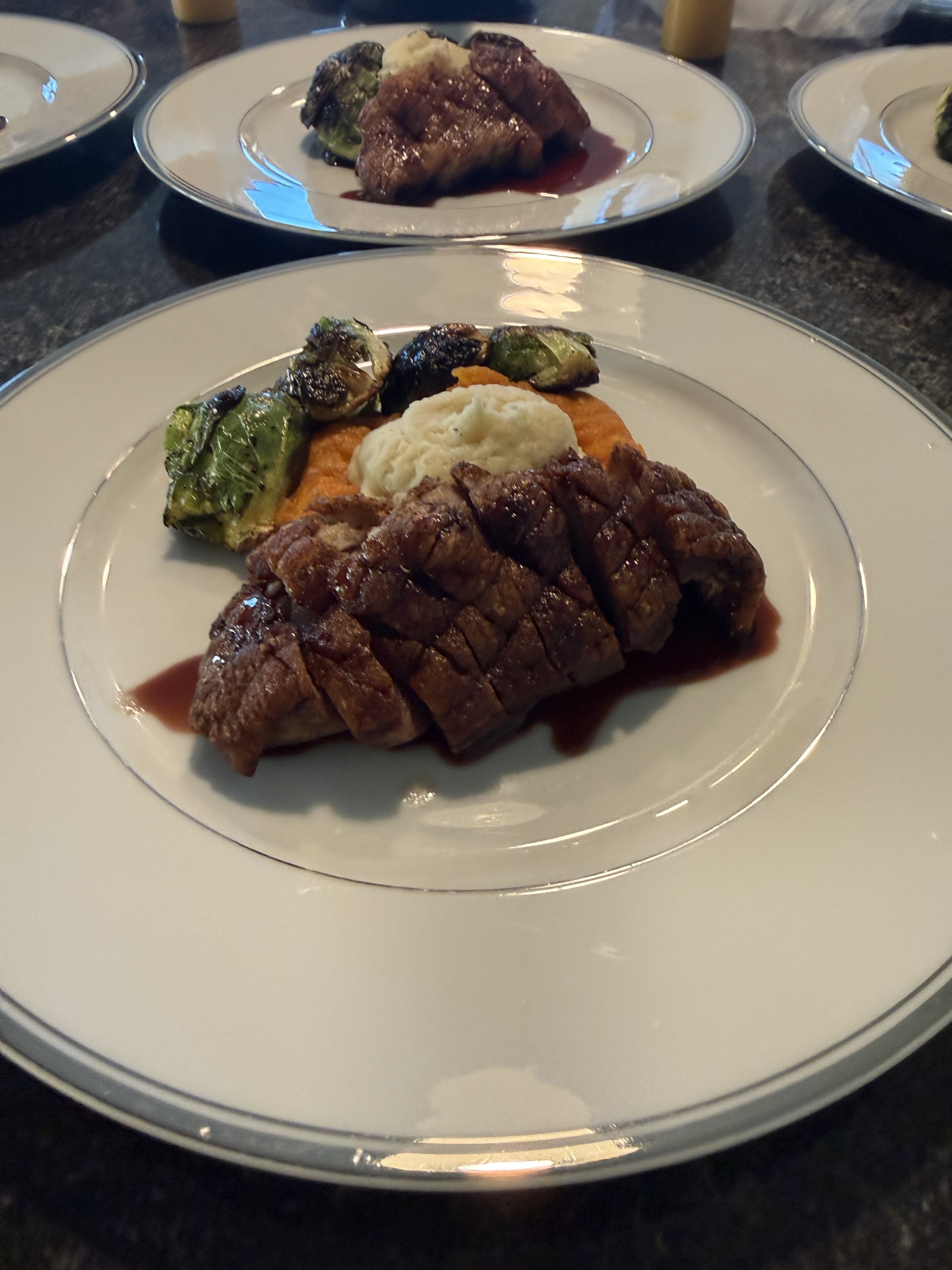 Seared duck breast, parsnip and sweet potato purée , Brussels sprouts, pomegranate Demi 