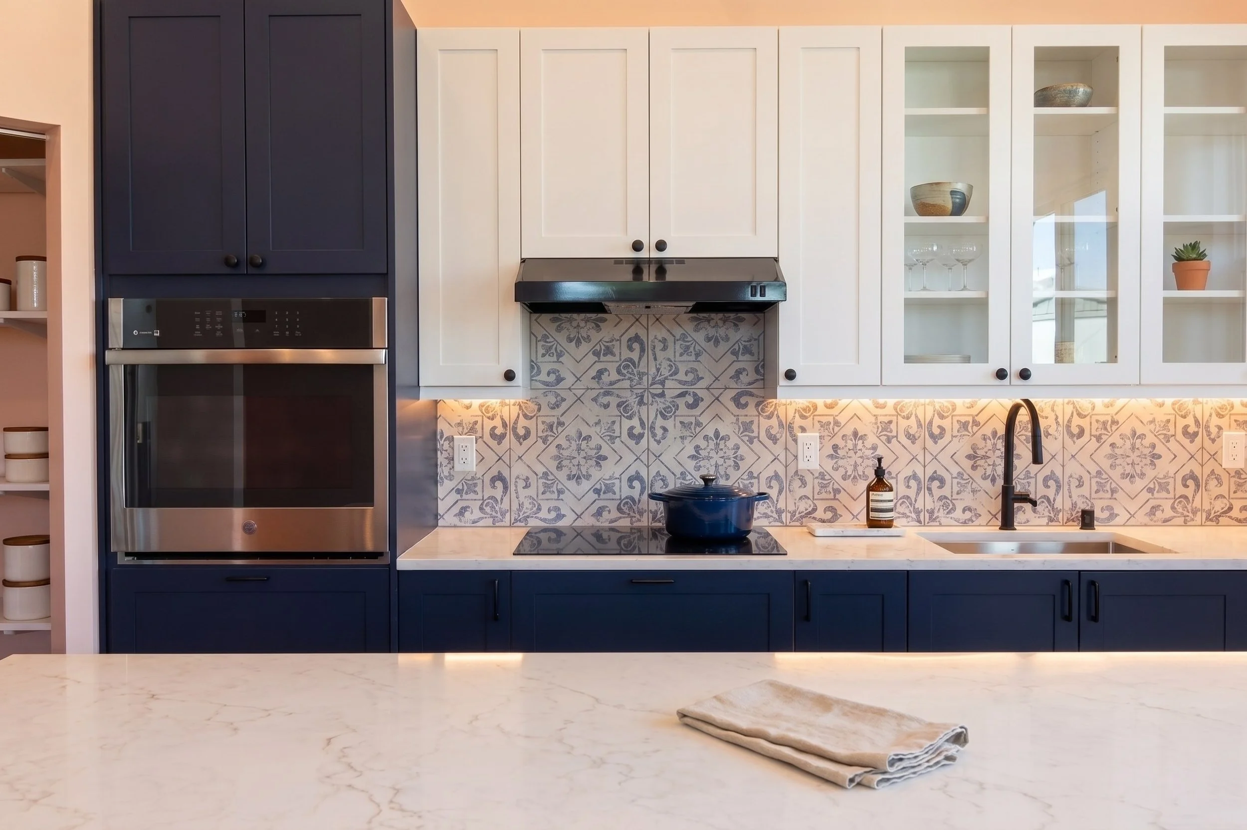 blue kitchen with white cabinets.jpg
