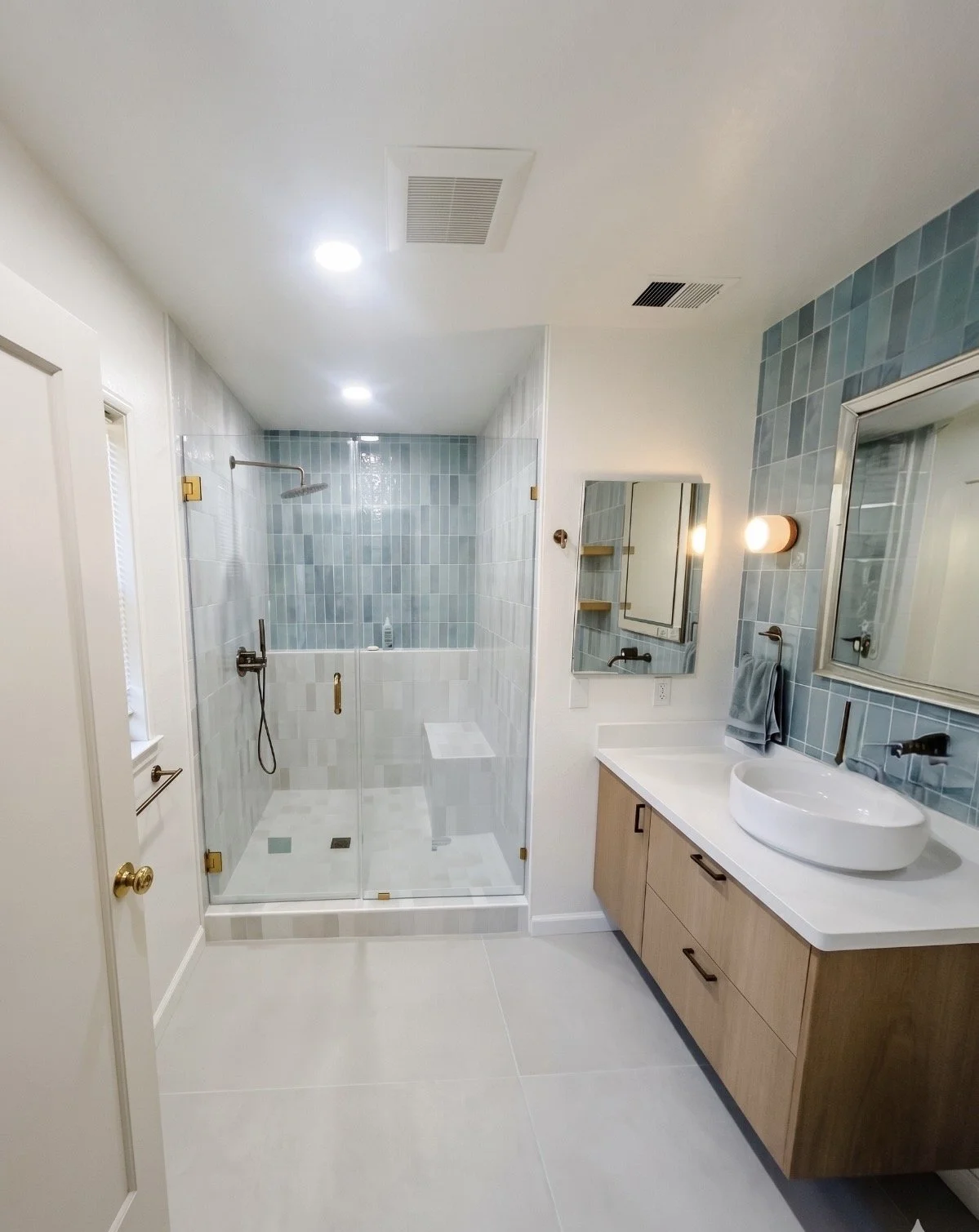 blue bathroom with white tile