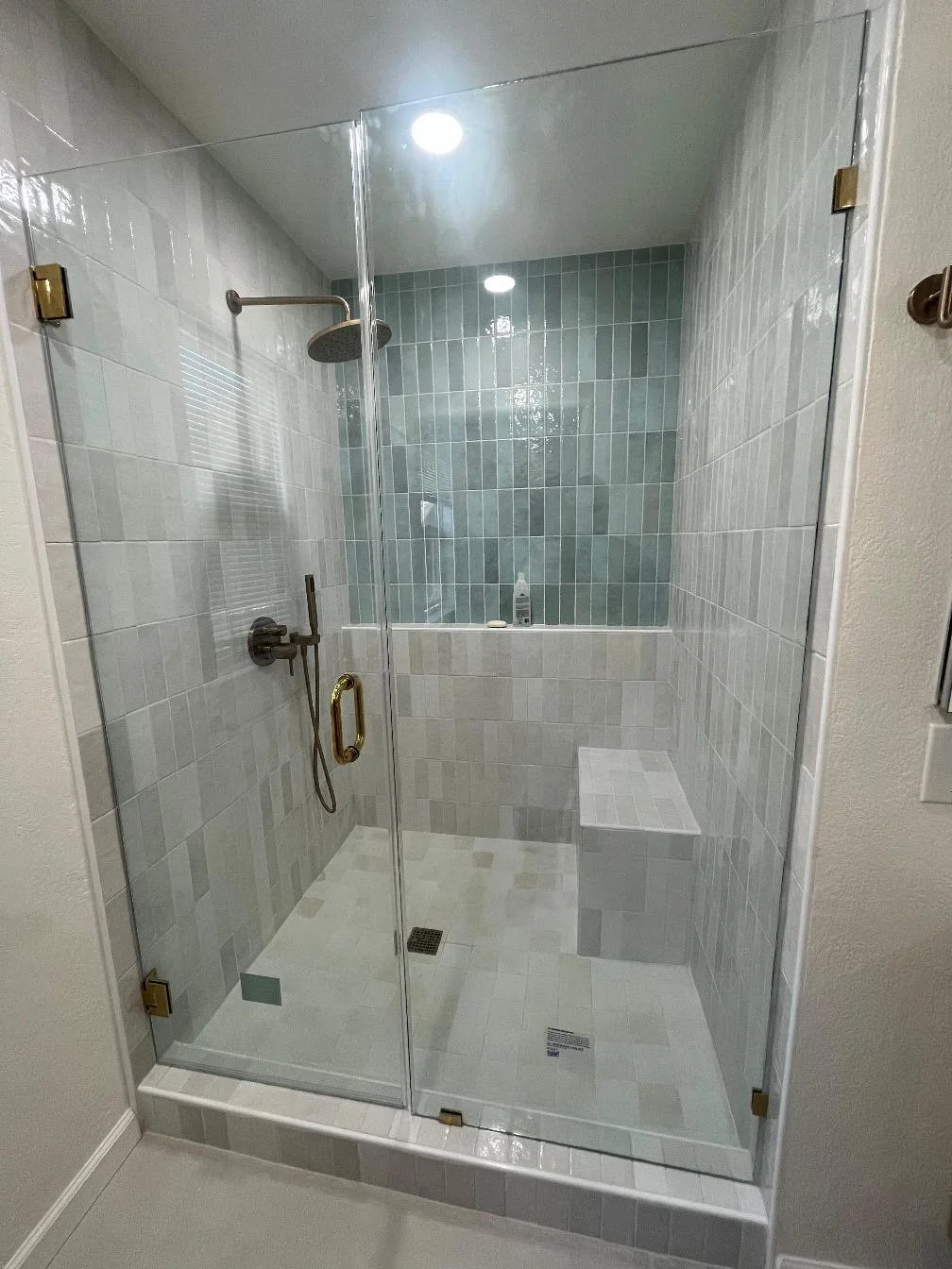 blue and white shower tile