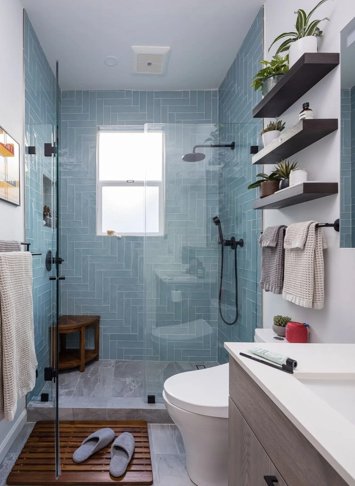 blue bathroom with gray tile.jpg