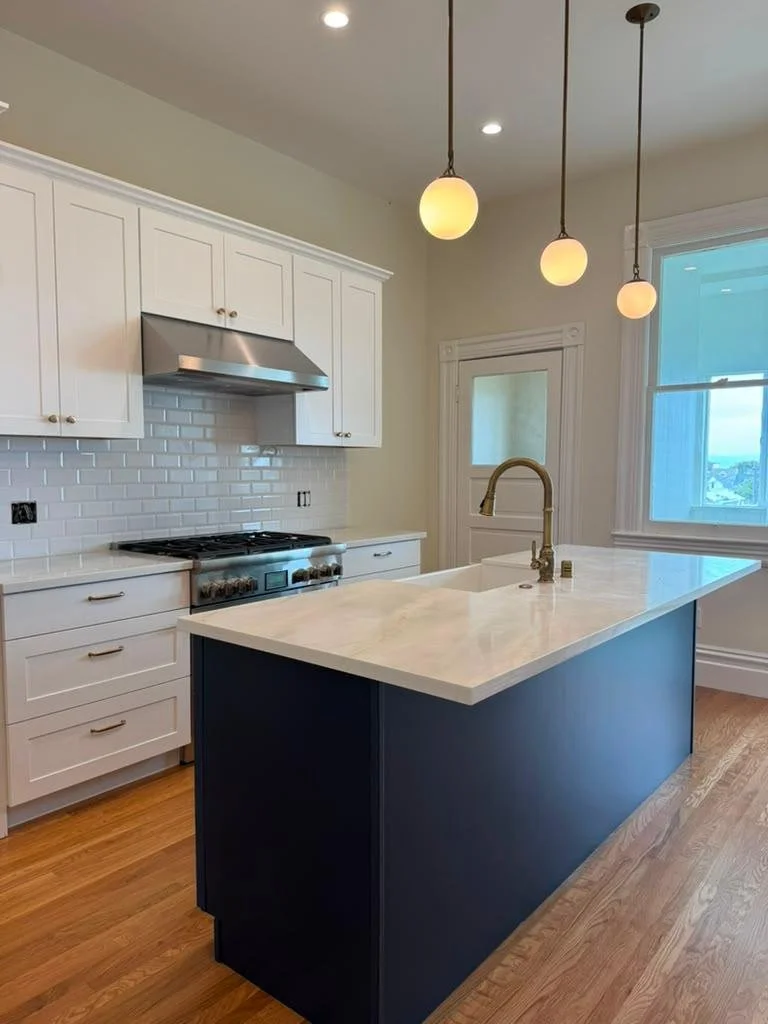 white and navy blue kitchen