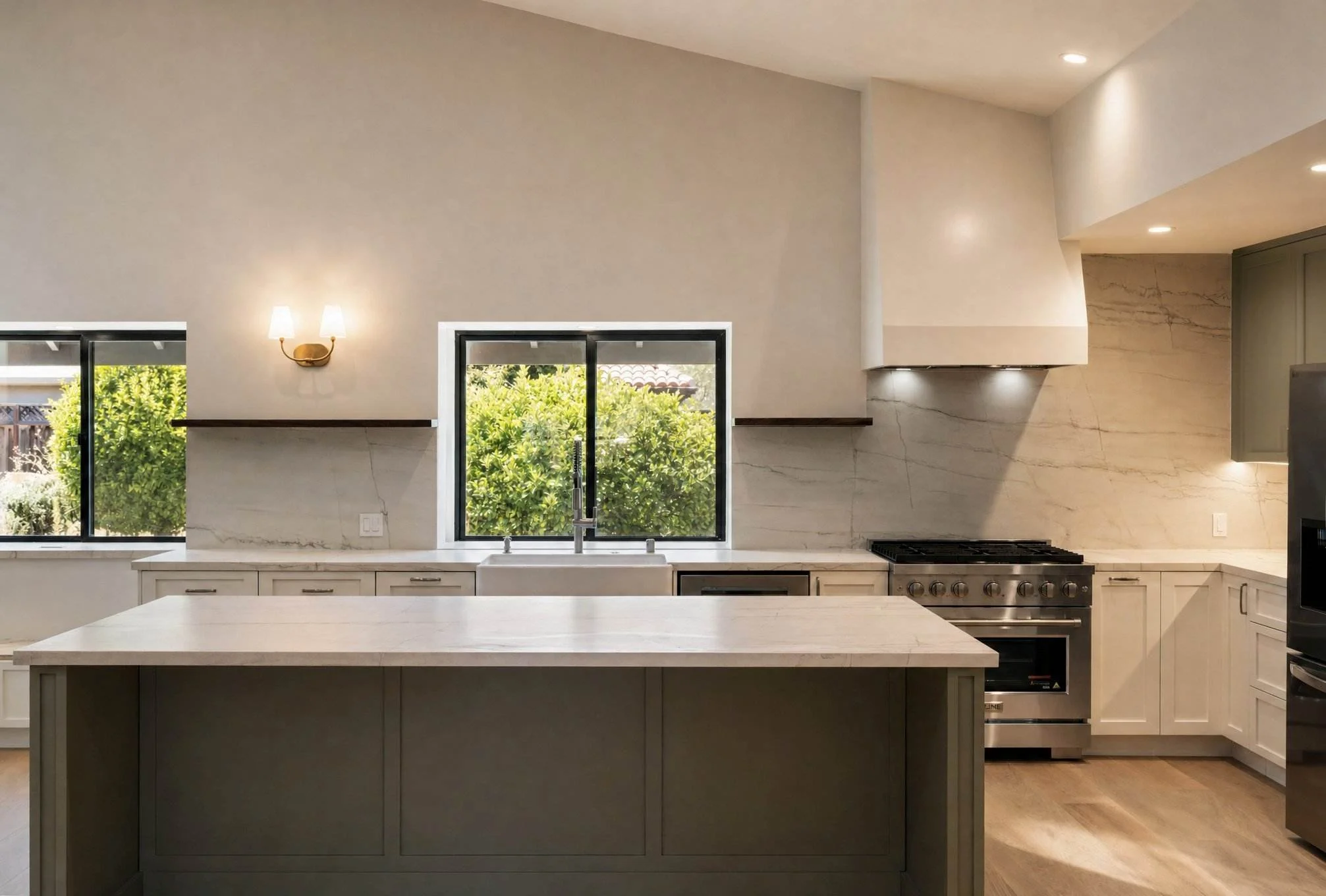 Sage green and white kitchen