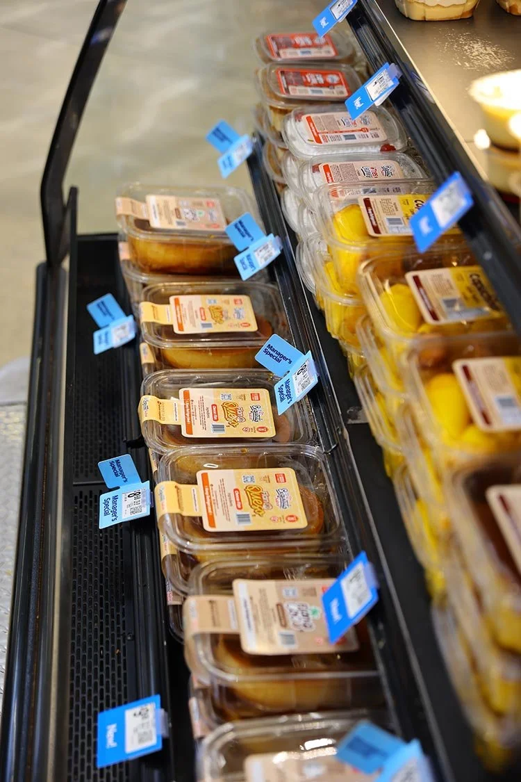 Walmart fridge with El Exquisito Sabor’s tres leches and flan desserts