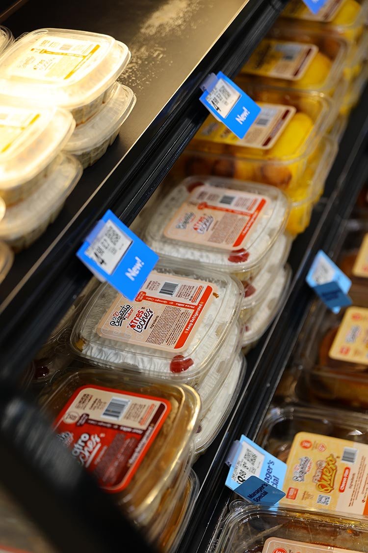 Retail display of El Exquisito Sabor products in Hispanic food section at Walmart