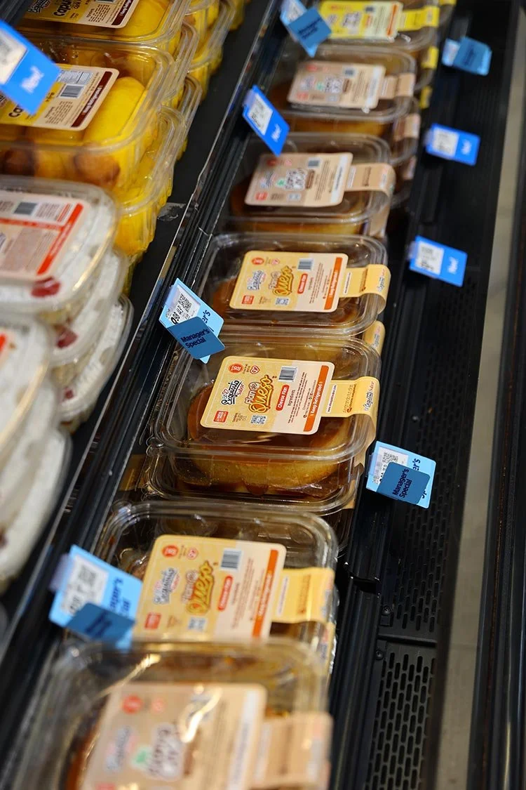 El Exquisito Sabor logo on flan packages inside Walmart cold section