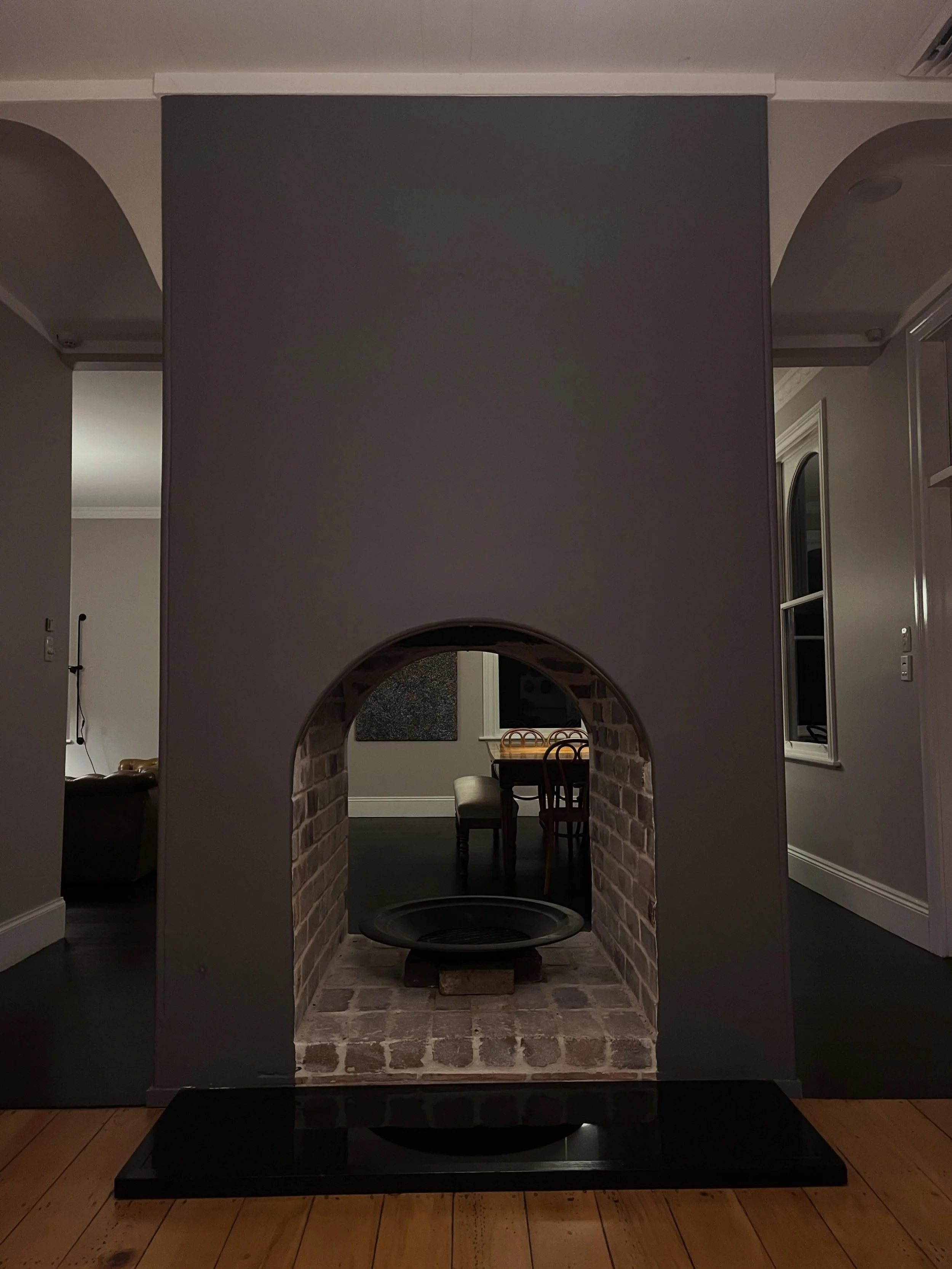 The opening up of this fireplace has transformed the space. It&rsquo;s simple and elegant; we have tried to be restrained, paring back to respect the old whilst giving new life. This was the old kitchen fireplace on one side and laundry on the other,