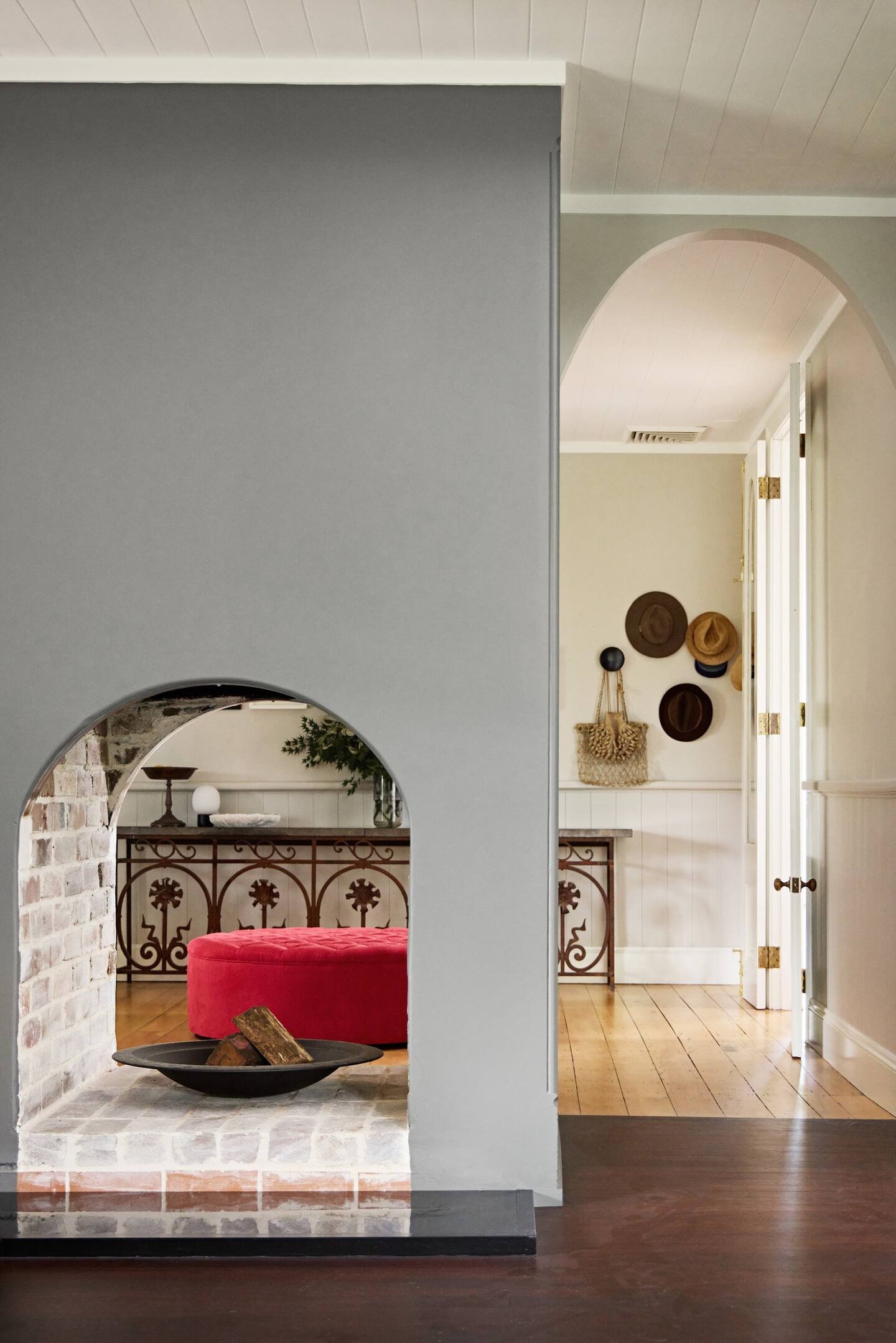The central fireplace has been redone to feature as a centrepiece bridging the atrium and dining spaces.