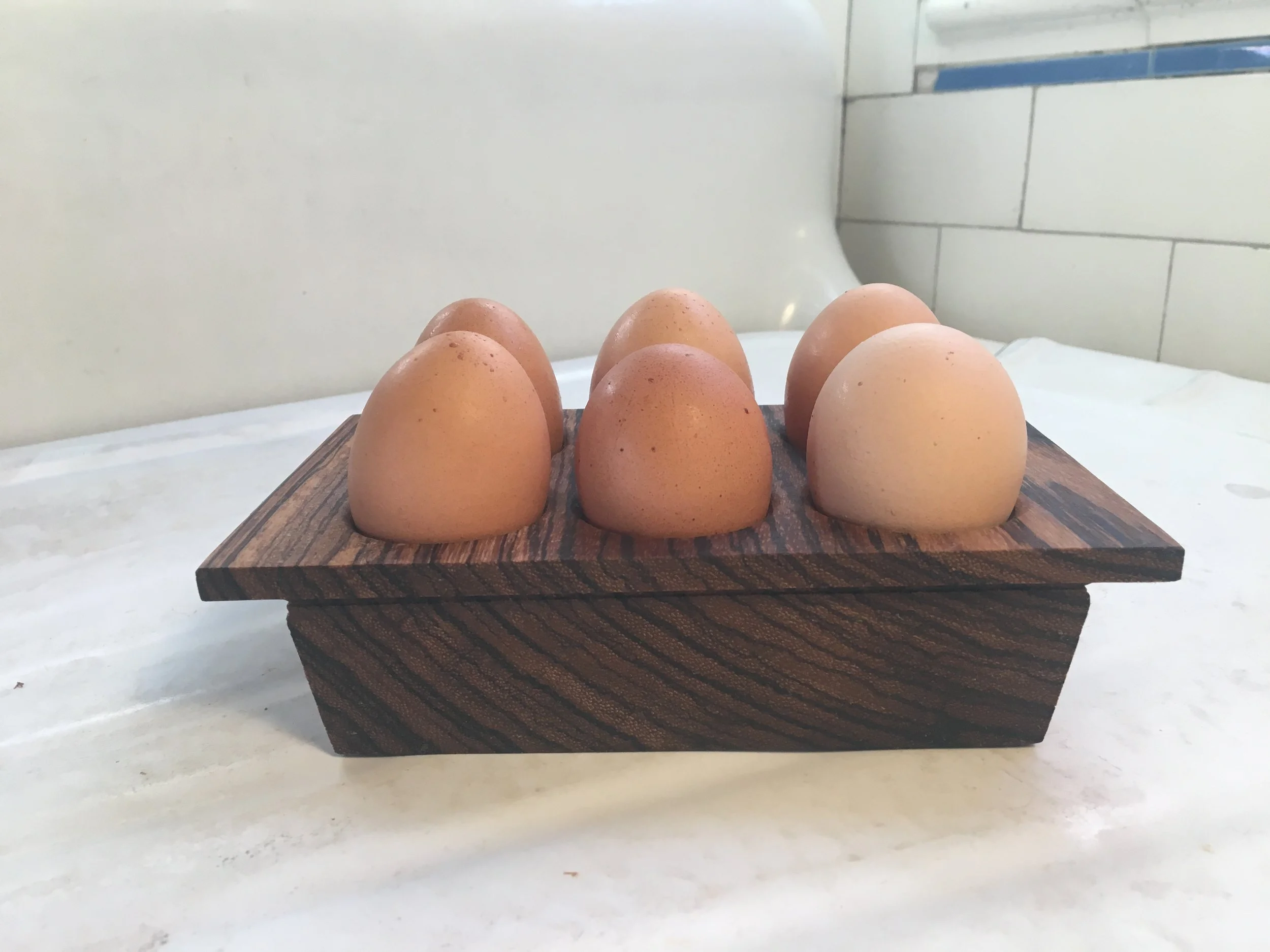 Half Doz w eggs high side.JPG