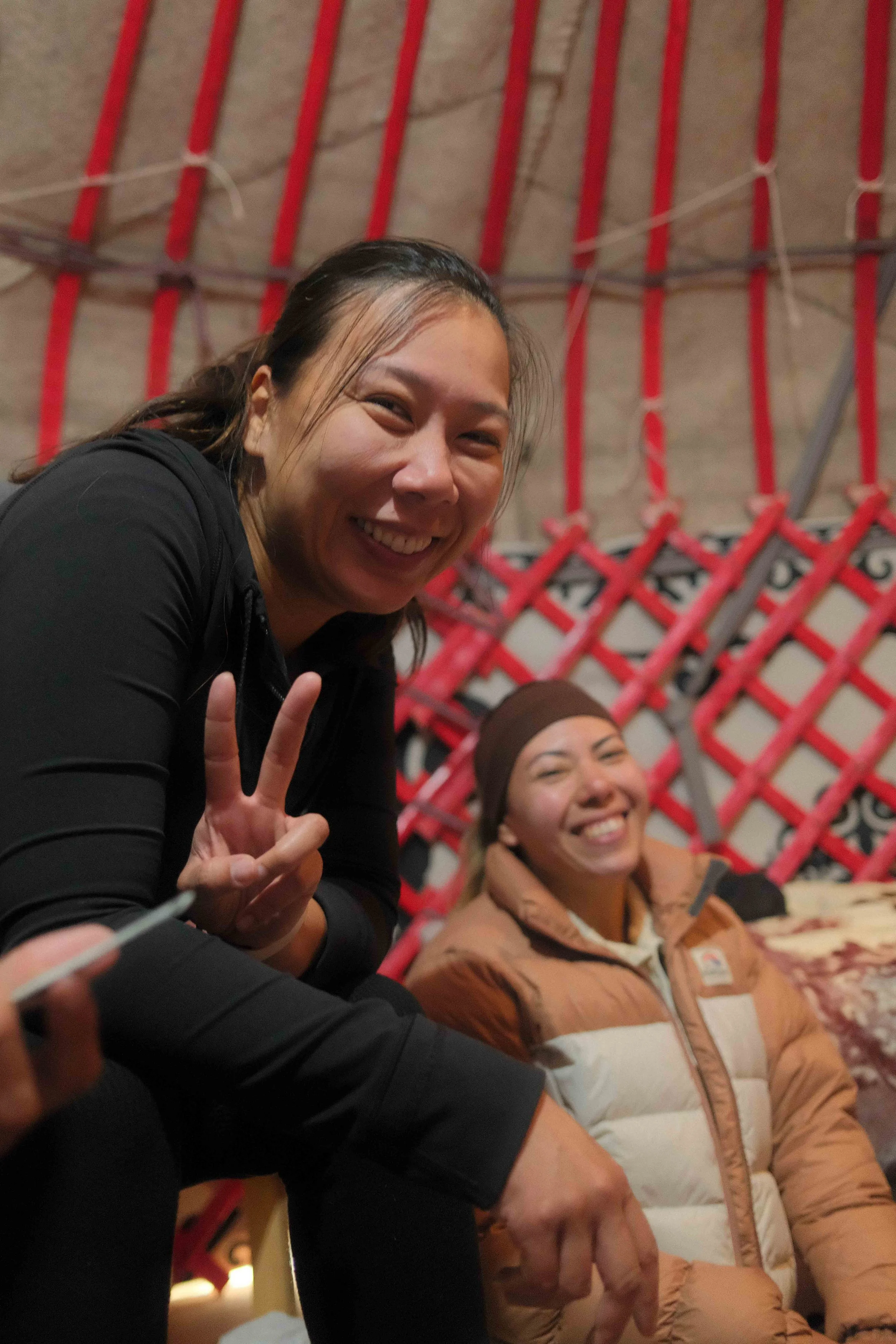 Friends inside traditional accommodation