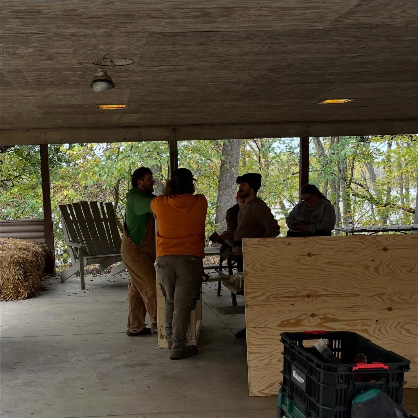 Some of our volunteers are taking some time to get some things done around camp during free time this afternoon. 
Pictured projects are storage building for a boys cabin and gutter guards on the pavilion.