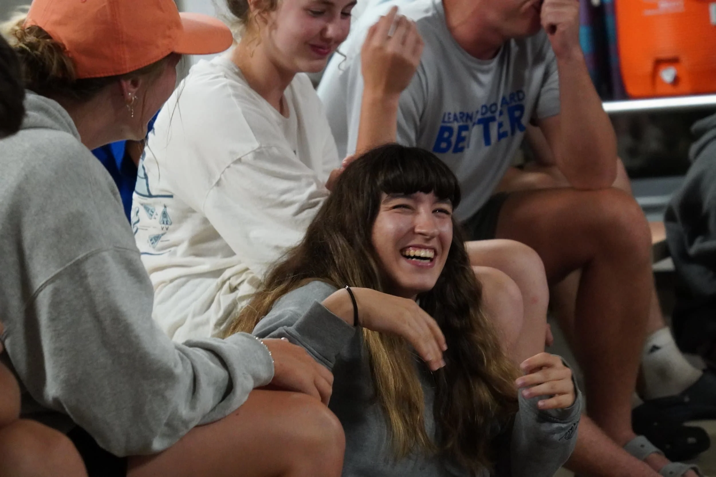 Senior campers laughing during night games