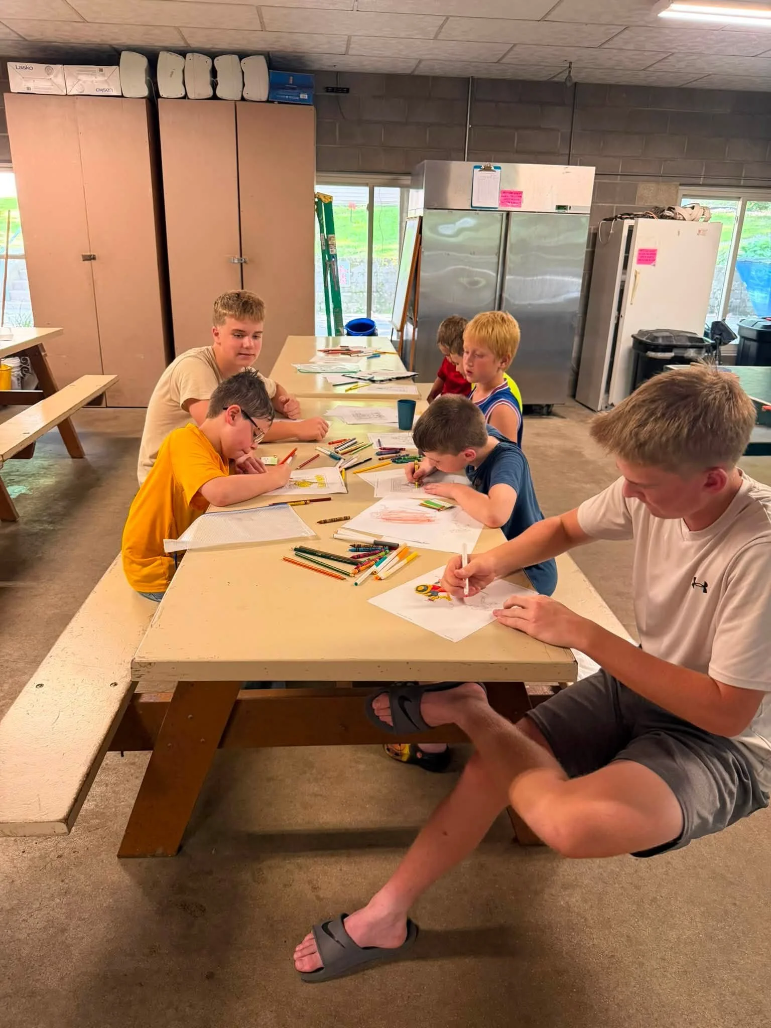 RRBC primary campers listening to instructions