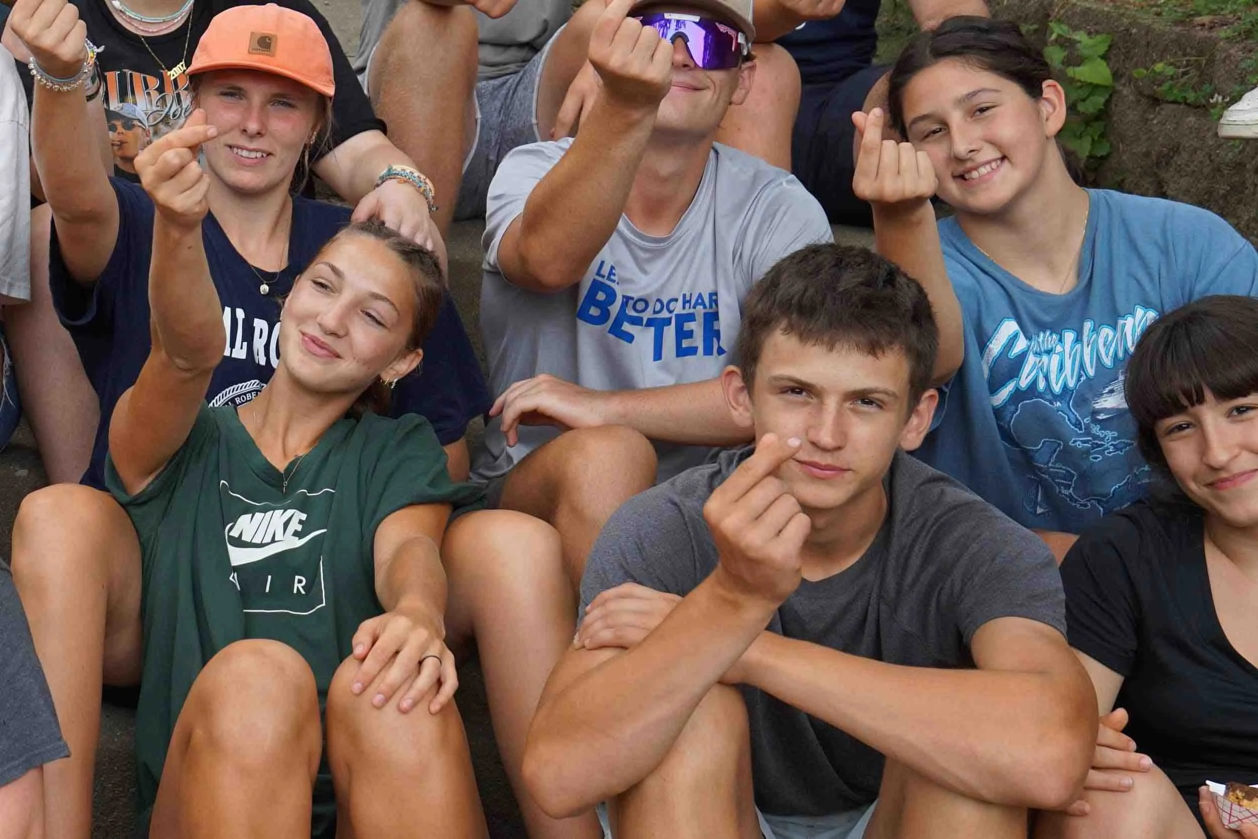 Rock River Bible Camp teens make heart hands