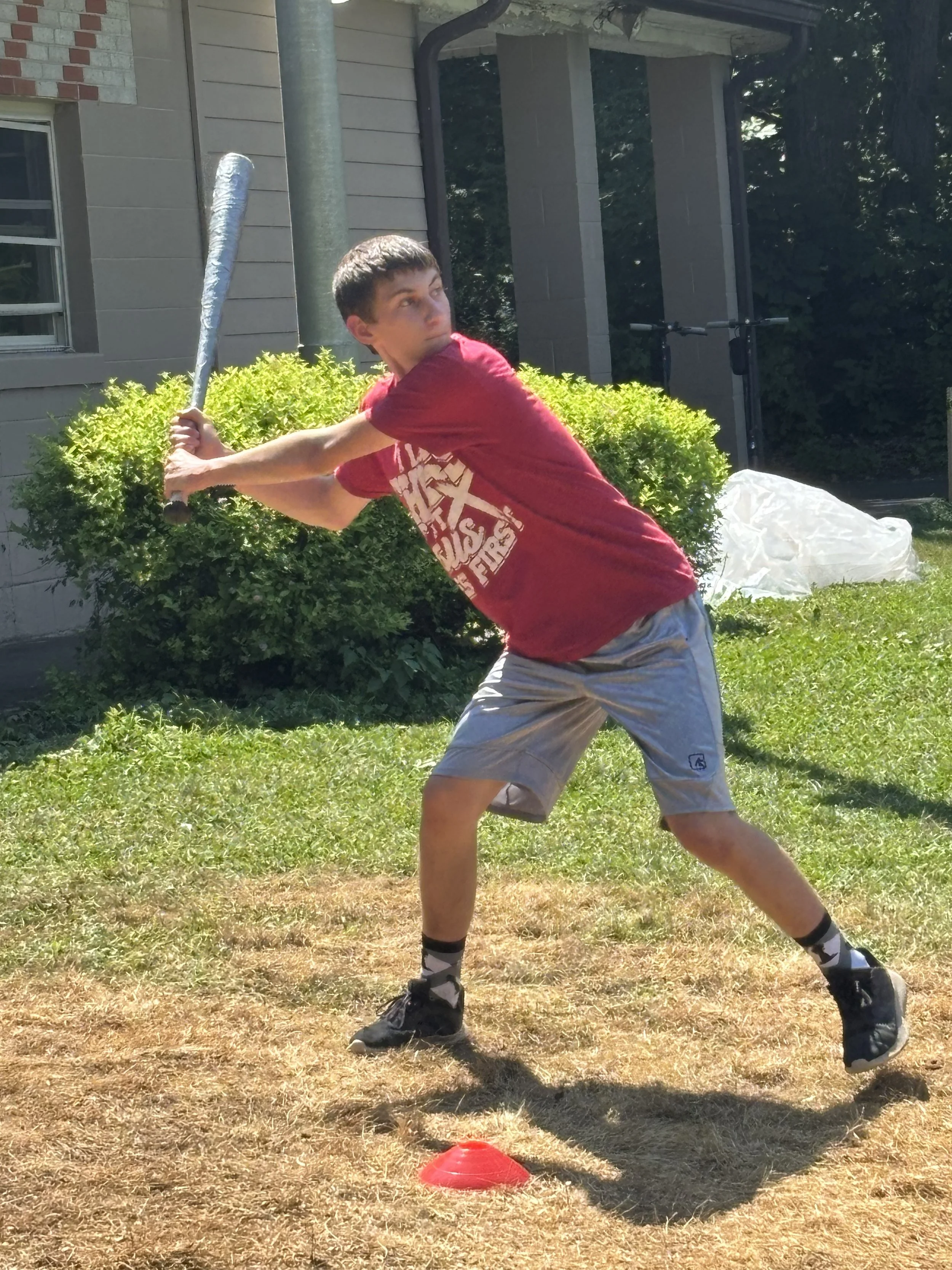 Senior campers playing flag football excitedly