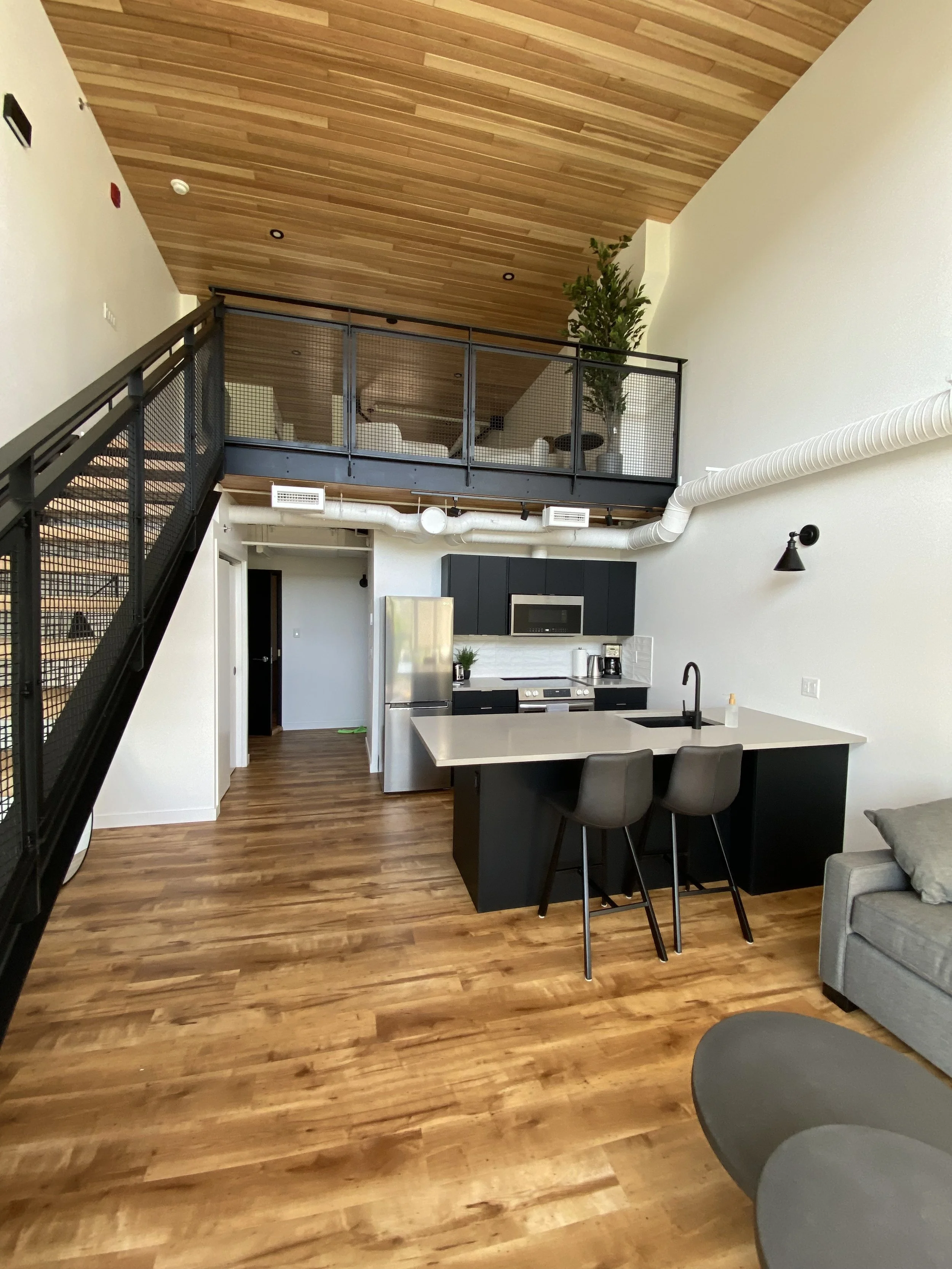 metal railings and ductwork painting at Osprey Nest in Williams Lake.jpg