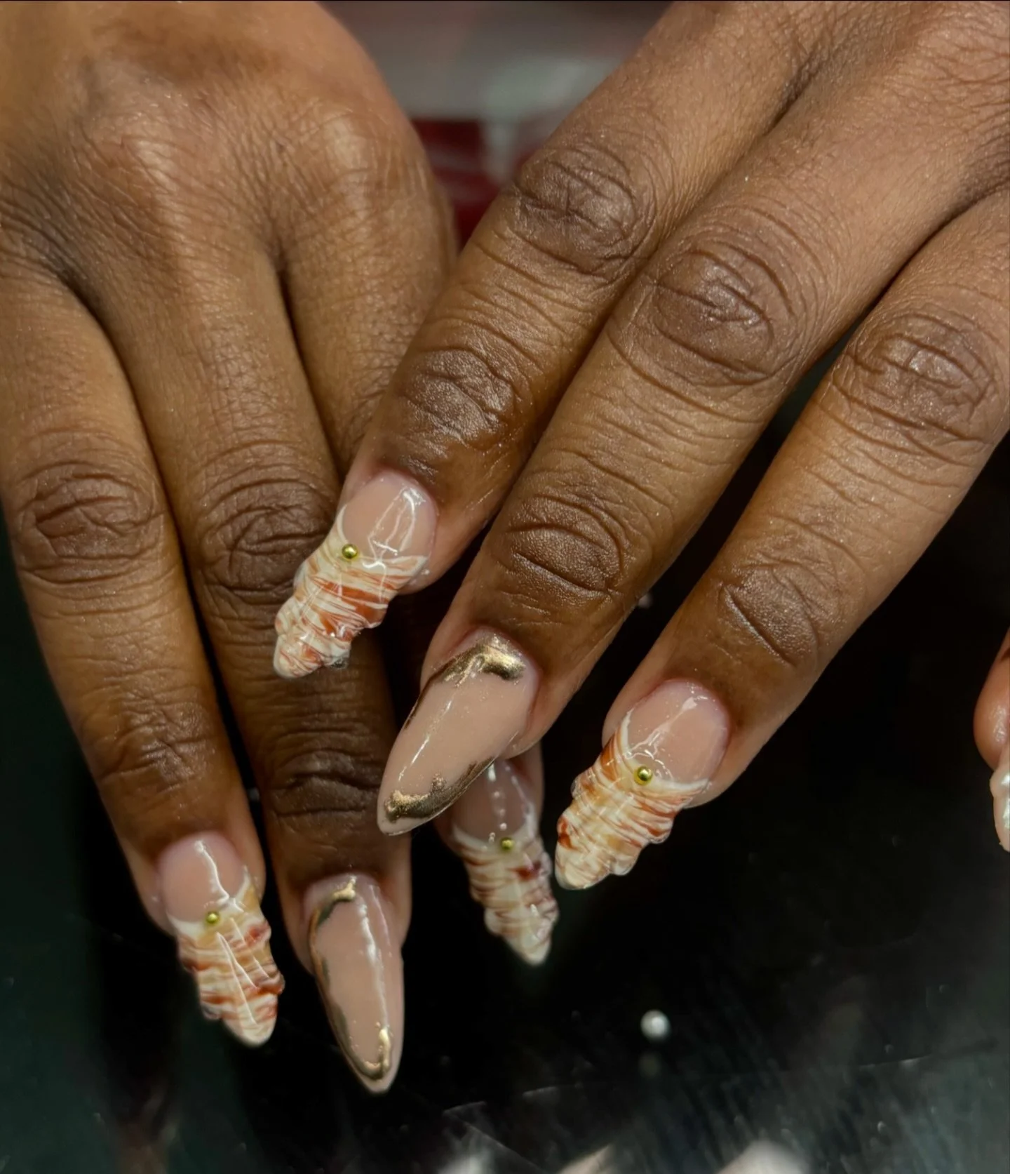 It&rsquo;s giving the seashells on the seashore 🐚 
-
-
-
-
-
-
-

#jaxnailtech #nailtech #nails #duvalnails #duvalcounty #shellnail #naildesign #nailart #chromenails #goldchromenails
