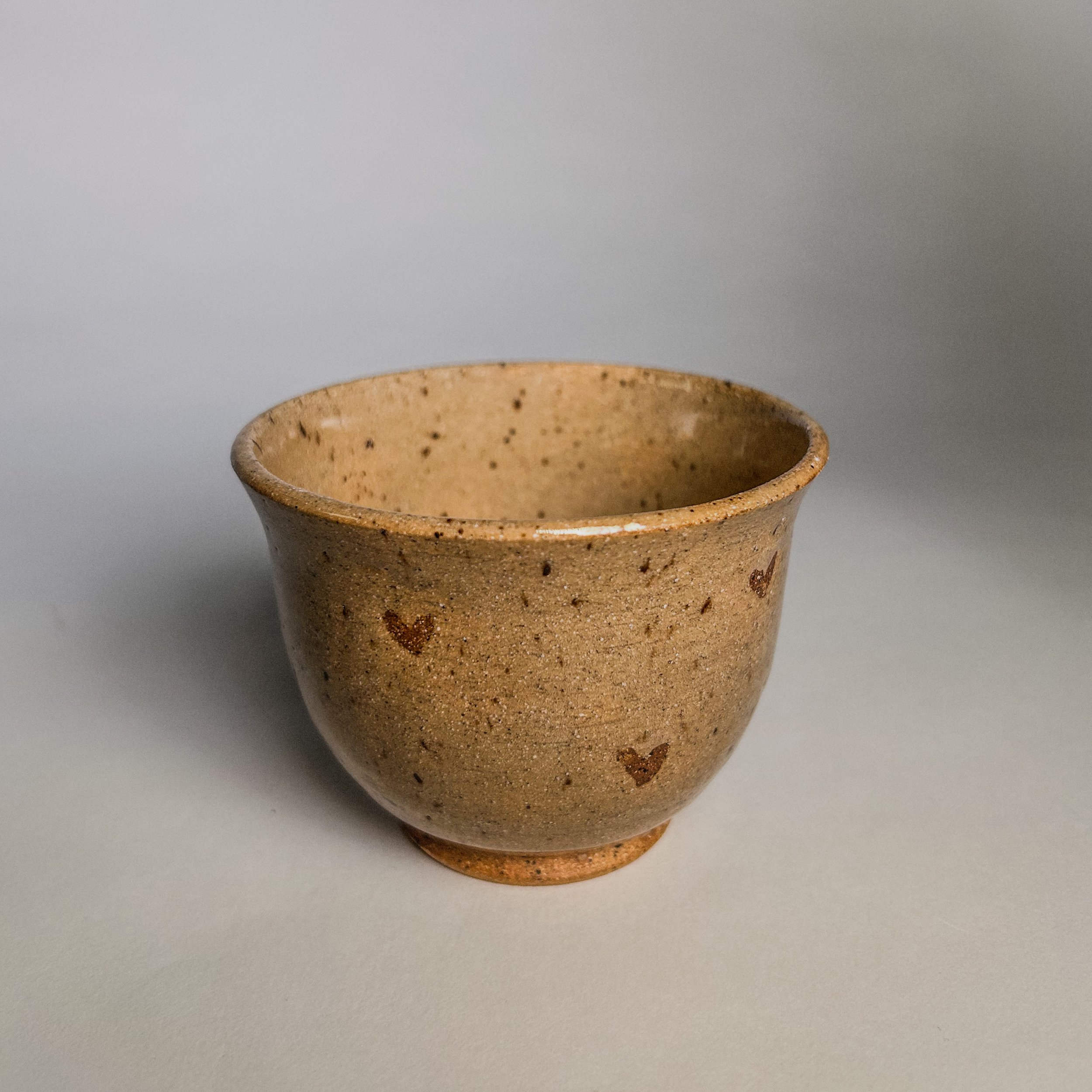a small, cute tea cup in ccss clay