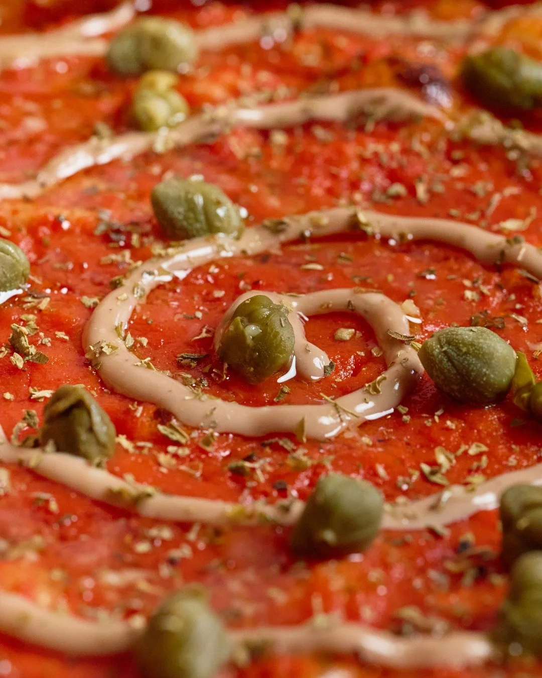 Our take on a Pizza Napoli with our signature tomato base, capers and anchovy cream 🍕
