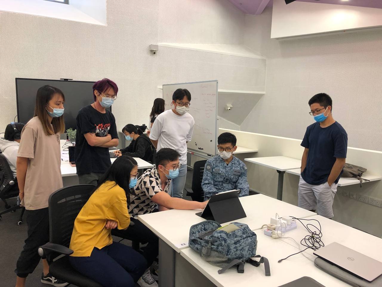 Chat4Good team members in consultation with RSAF team