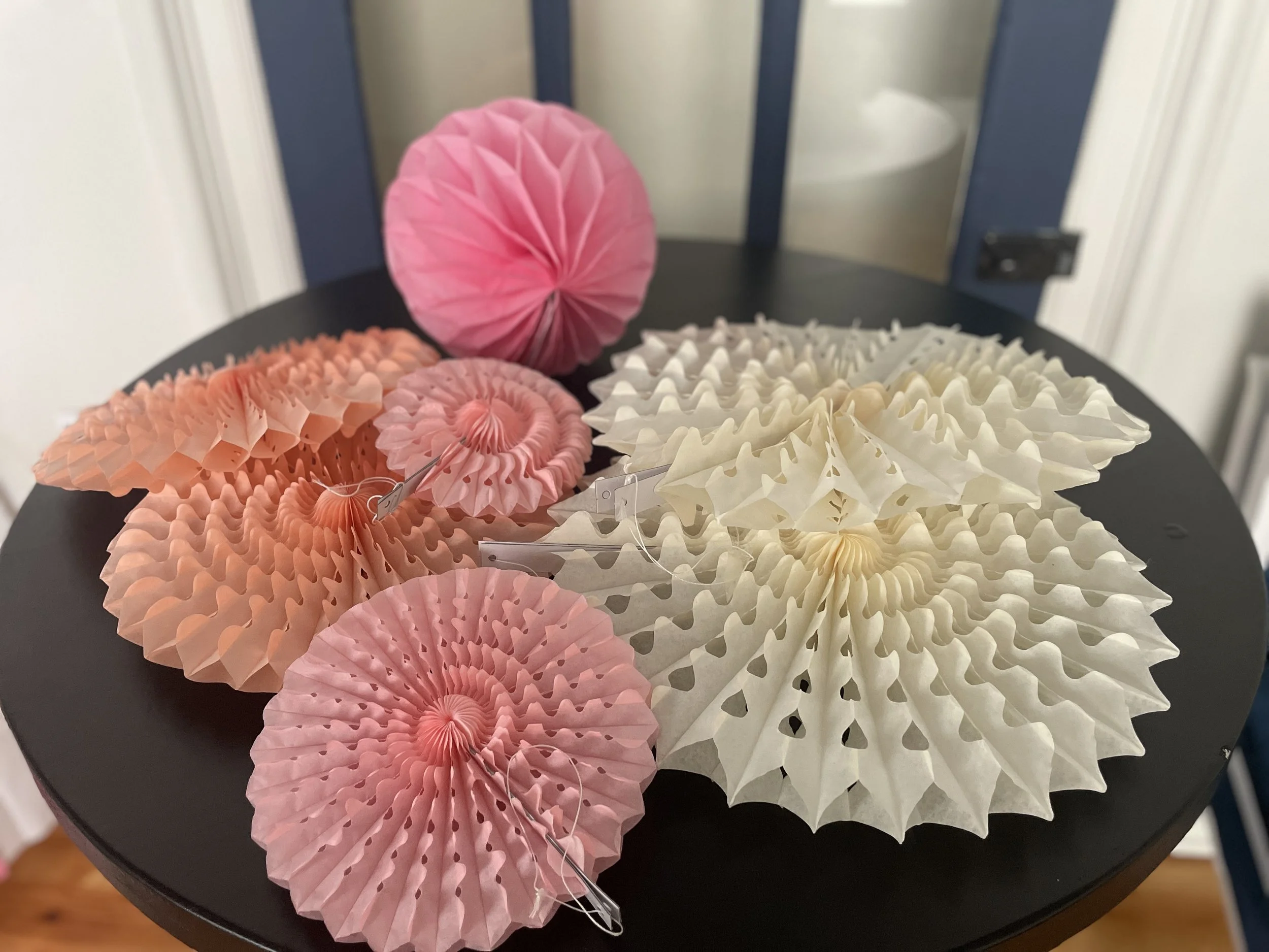 White, pink and peach paper decorations