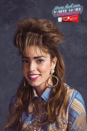 Retro school portrait with big hair and a white smile